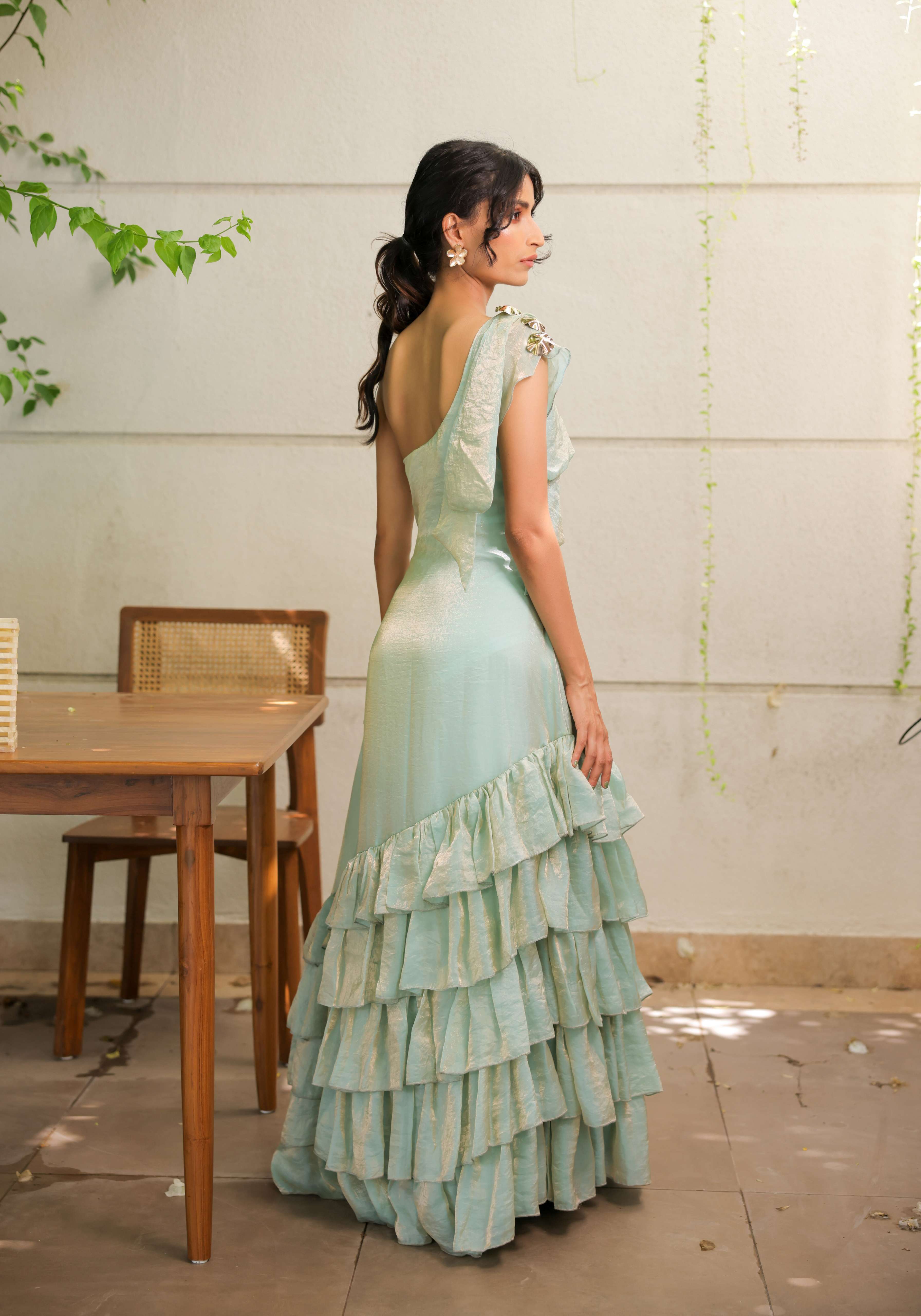 A model showcasing Sky Blue Ruffle One Shoulder Maxi Dress by Foram Patel from Foram Patel's collection
