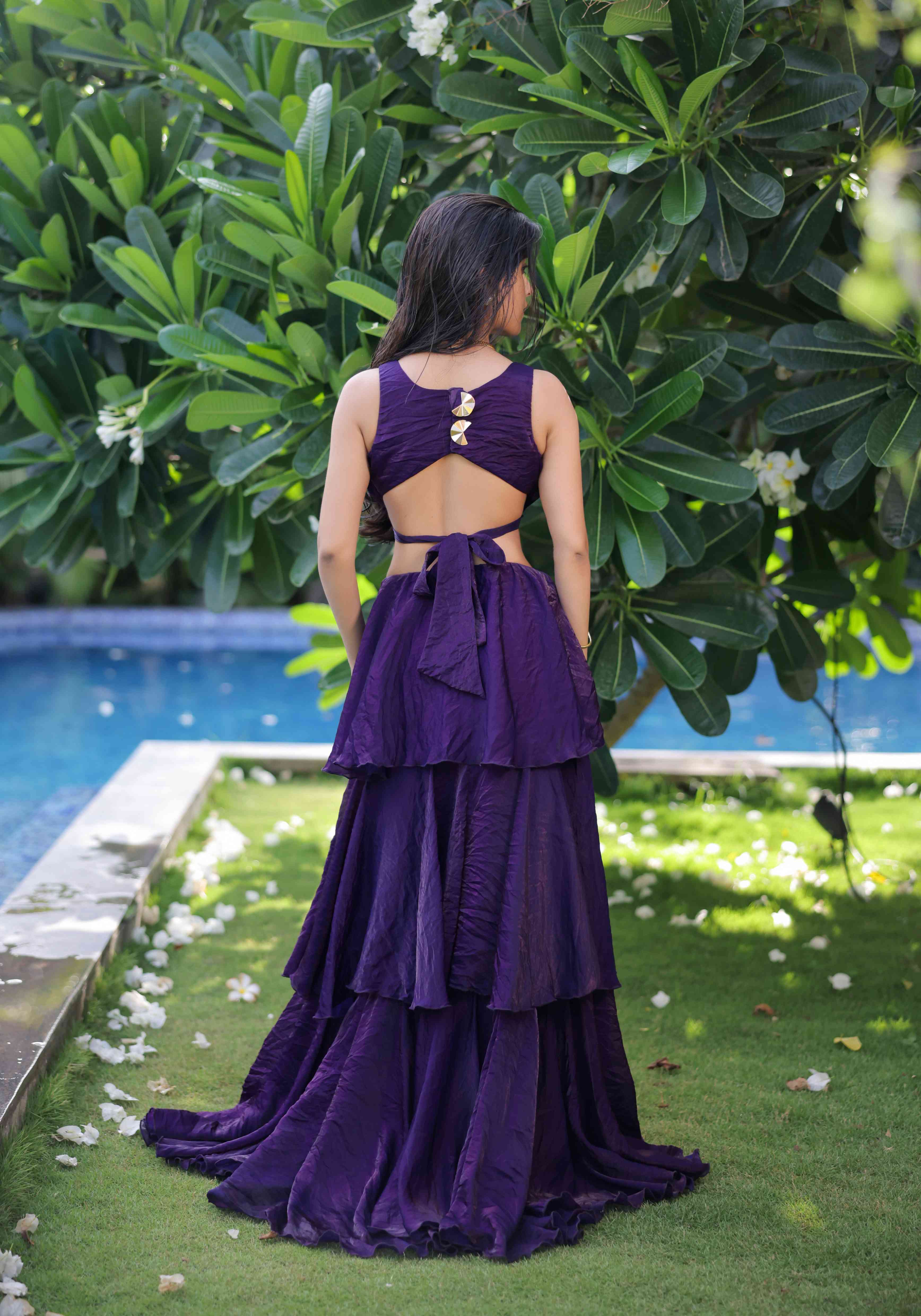 A model showcasing Purple Ruffle Maxi Dress by Foram Patel from Foram Patel's collection