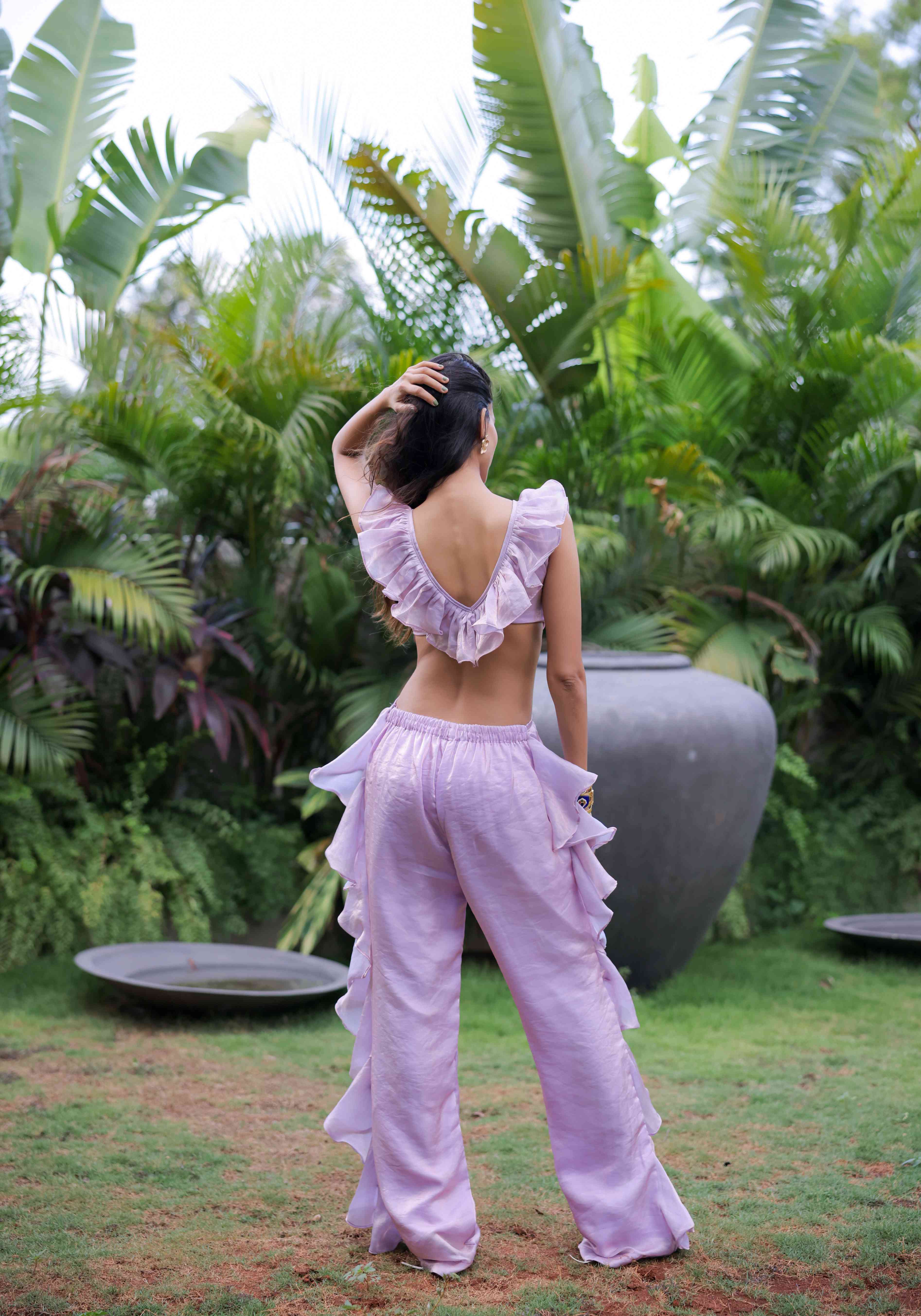 A model showcasing Lilac Ruffle Jumpsuit by Foram Patel from Foram Patel's collection