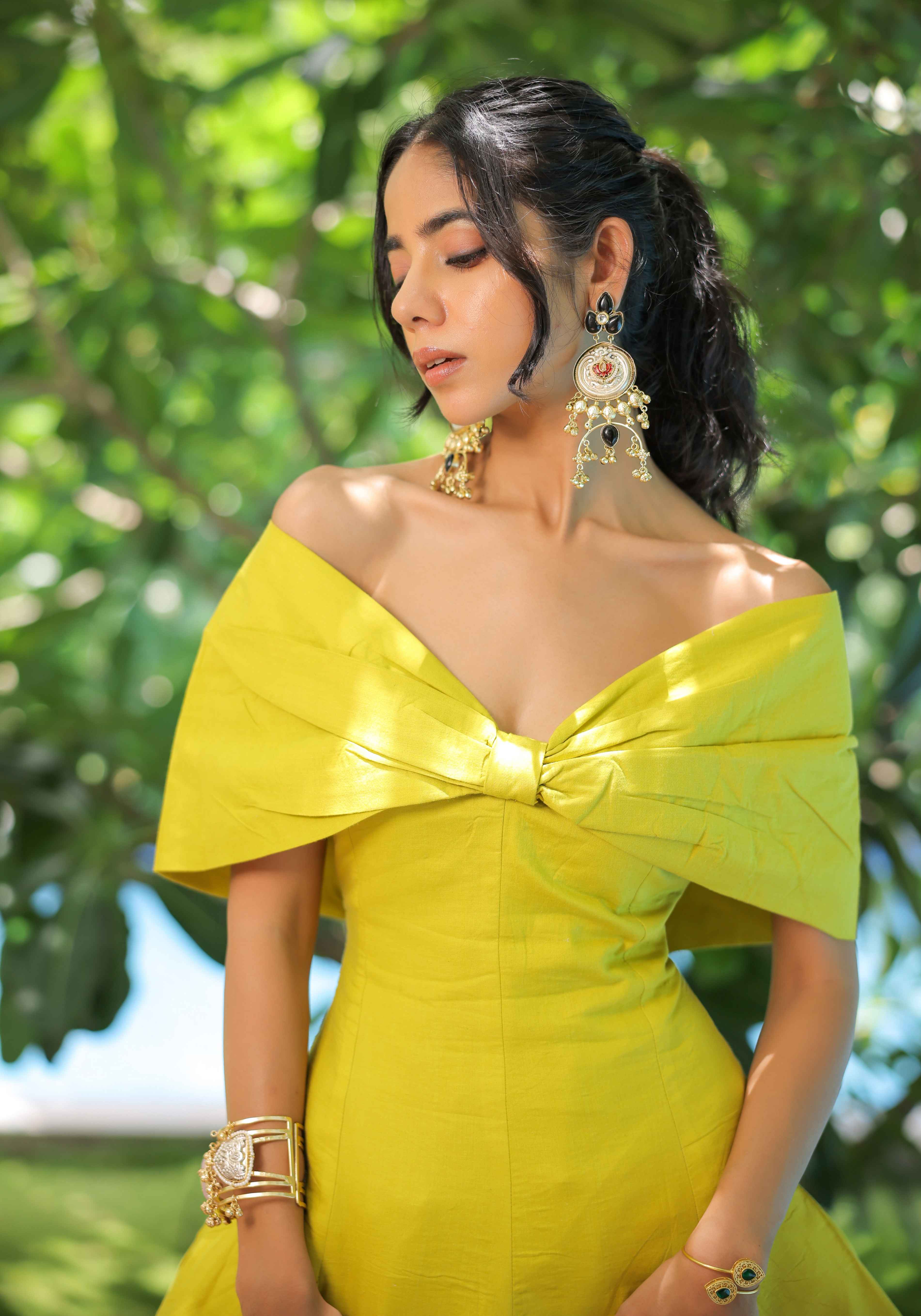 A model showcasing Lime Green Bow Dress by Foram Patel from Foram Patel's collection