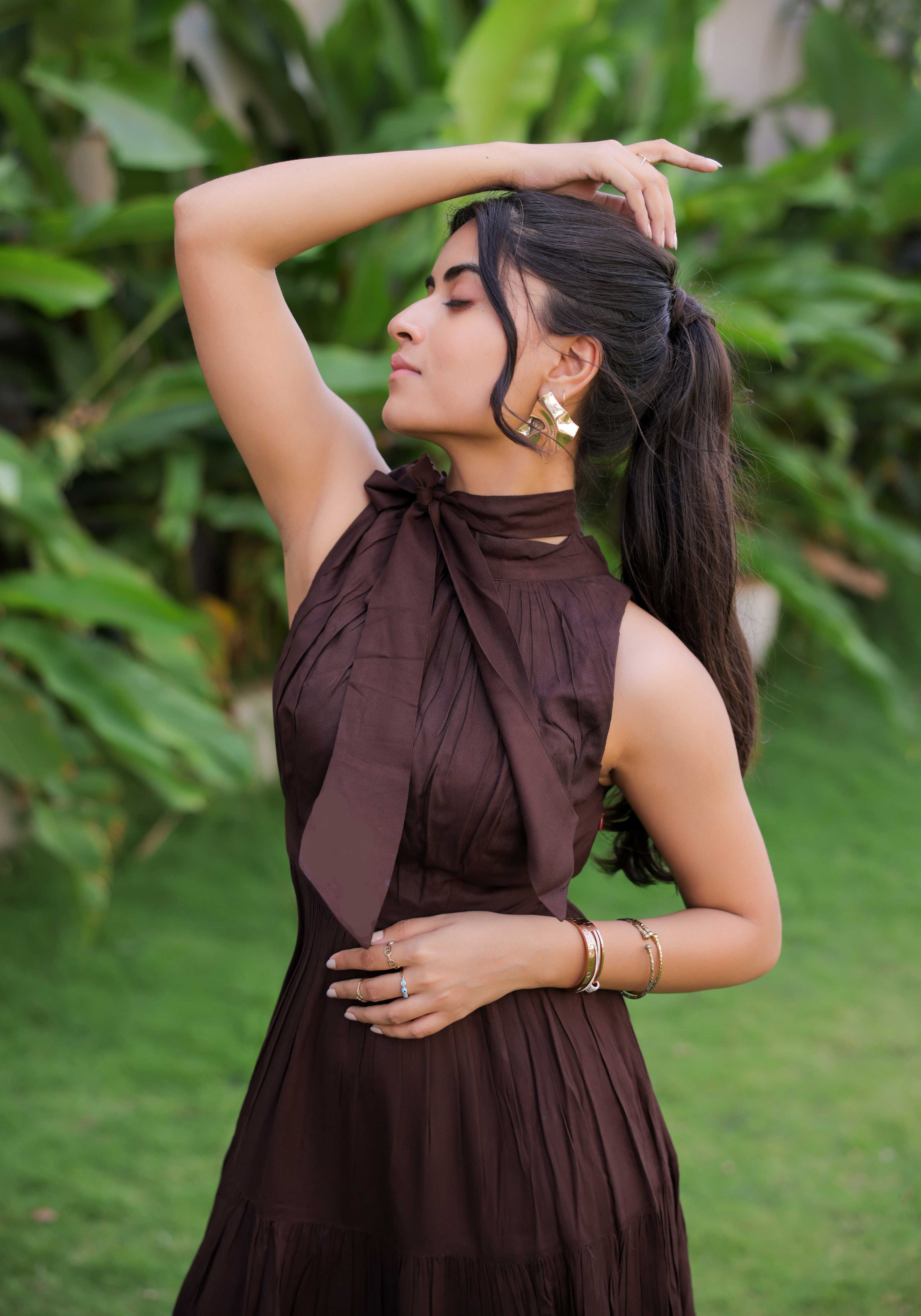 A model showcasing Dark Brown Tiered Maxi Dress by Foram Patel from Foram Patel's collection