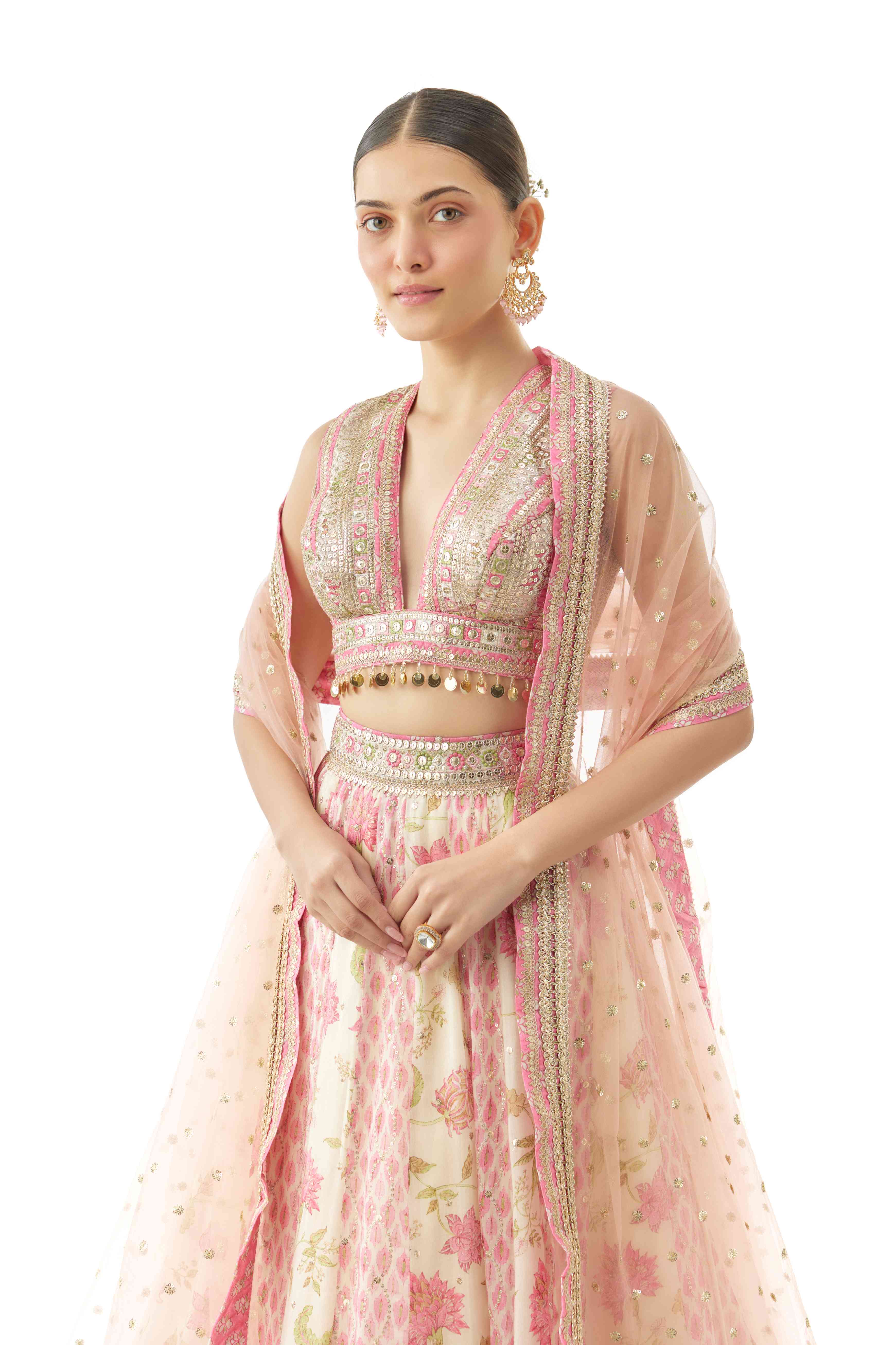 A model showcasing Devyani Ivory Lehenga Set by Gopi Vaid from Gopi Vaid's collection