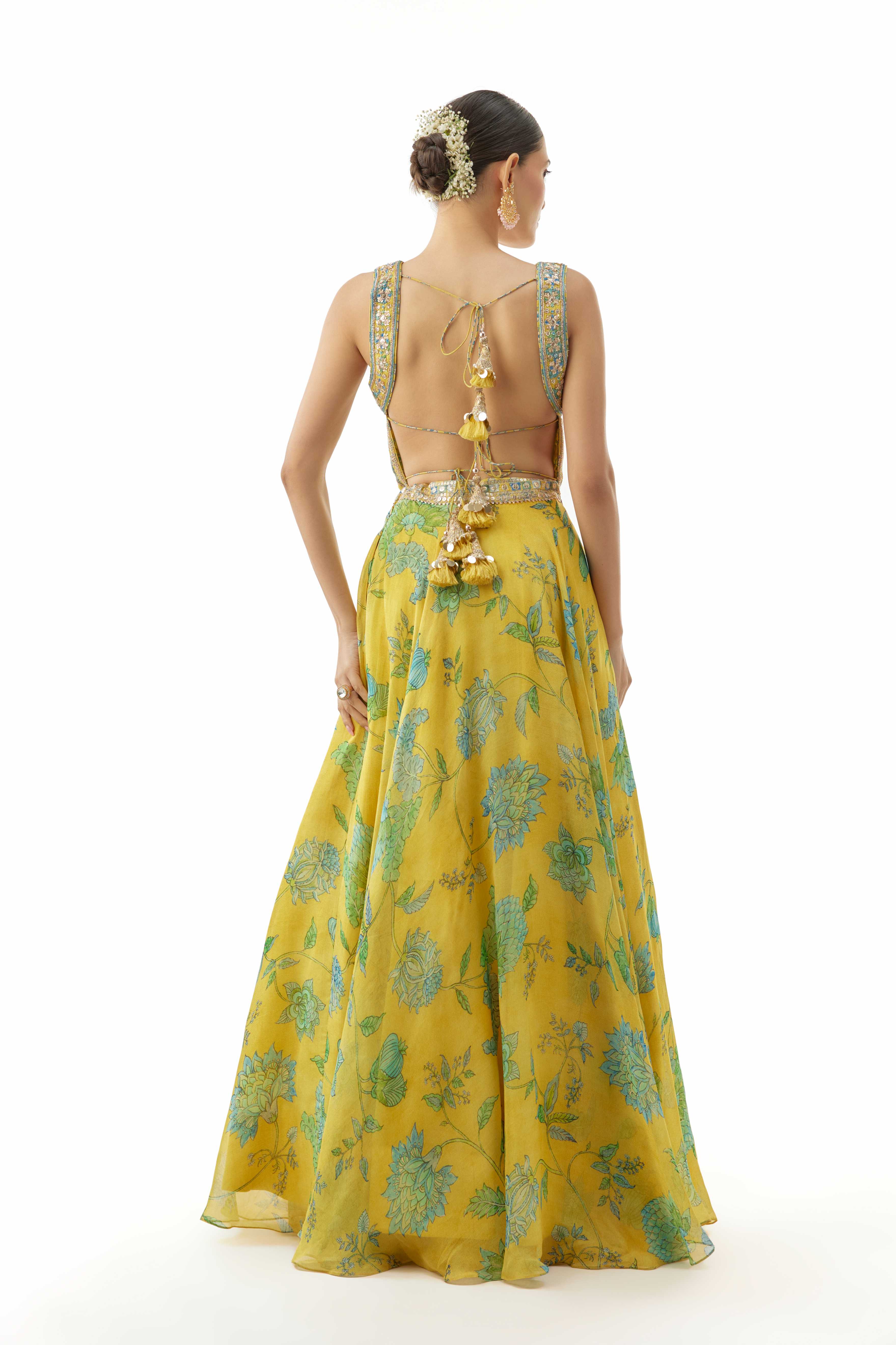 A model showcasing Zaira Yellow Lehenga Set by Gopi Vaid from Gopi Vaid's collection