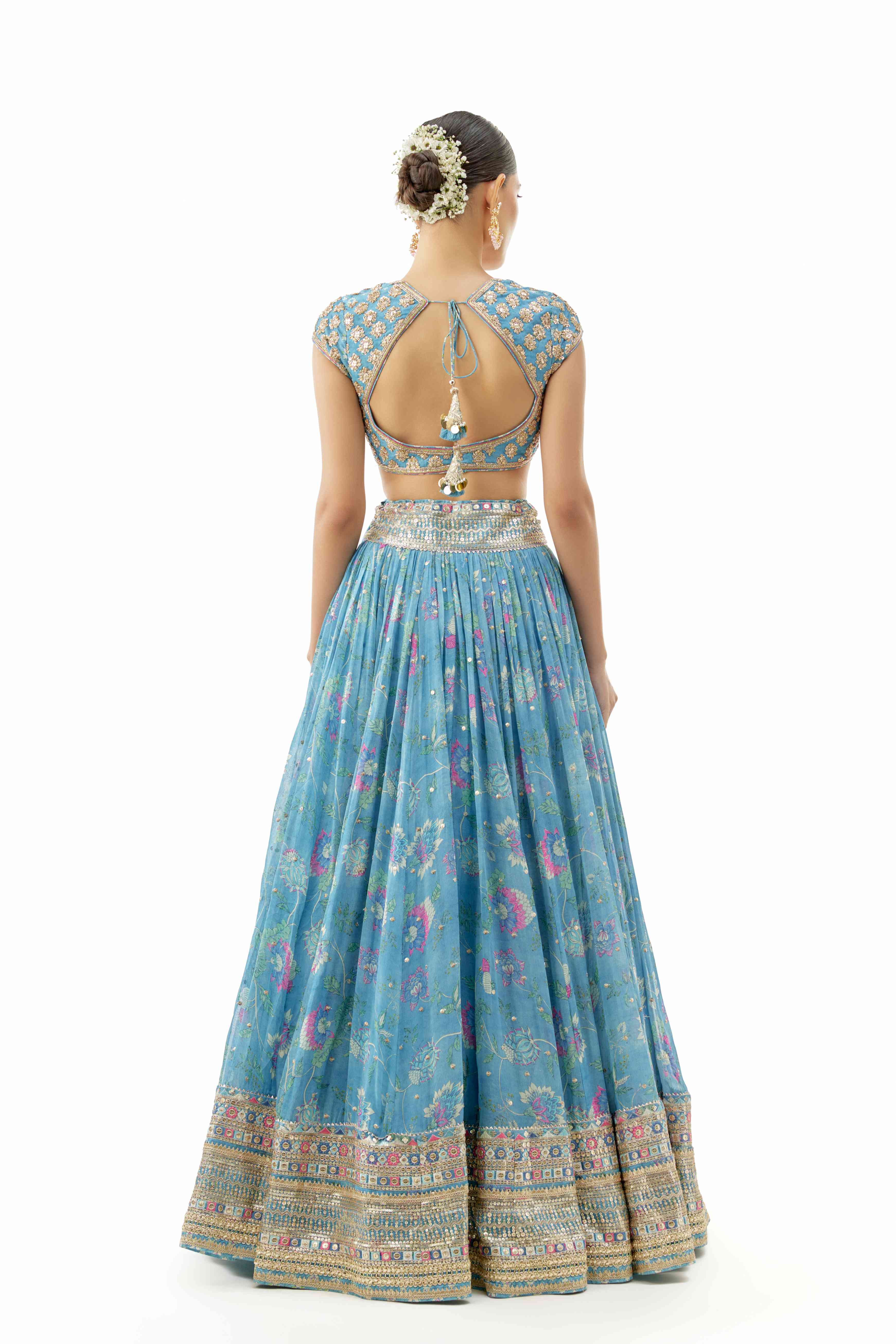 A model showcasing Zil Blue Lehenga Set by Gopi Vaid from Gopi Vaid's collection