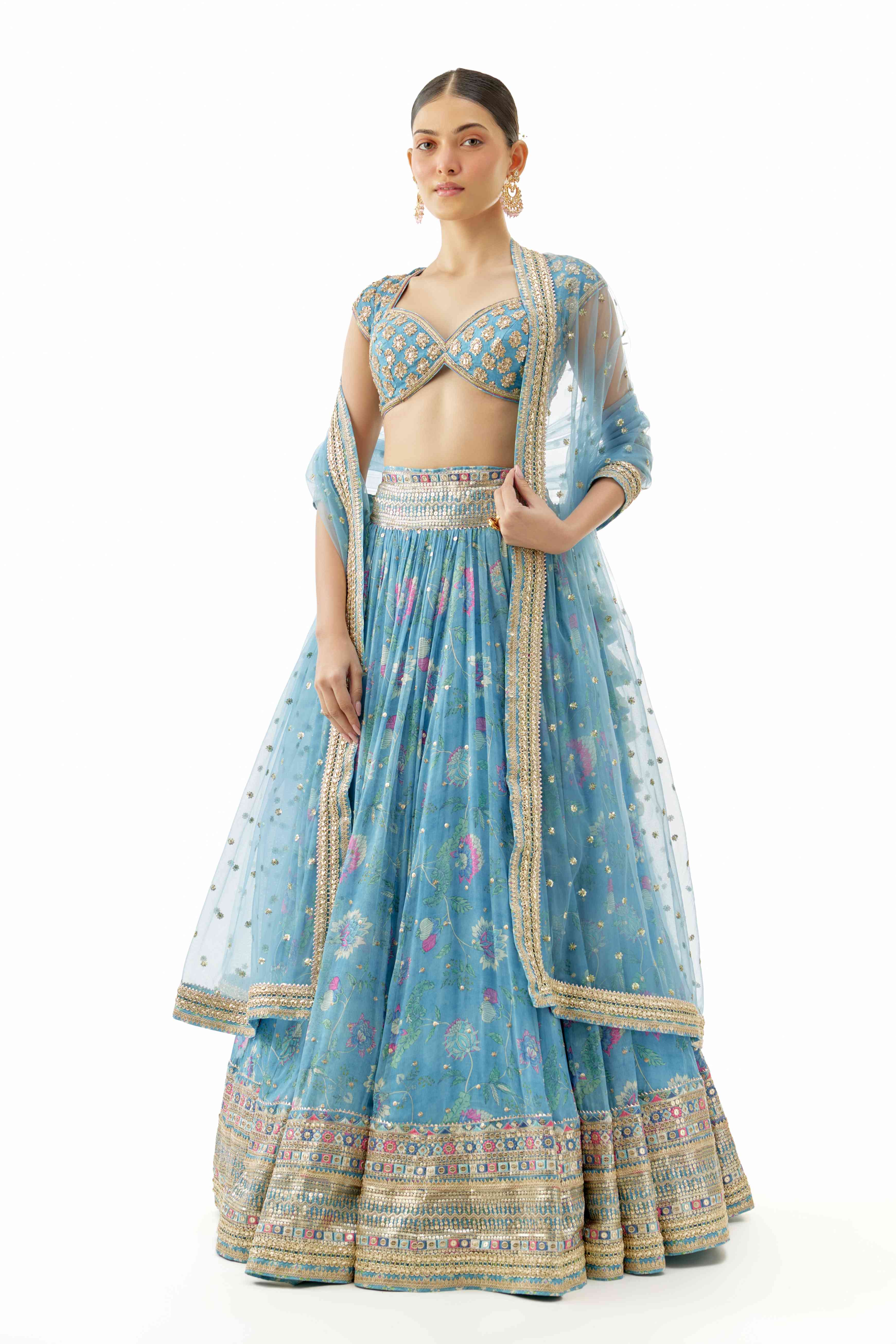 A model showcasing Zil Blue Lehenga Set by Gopi Vaid from Gopi Vaid's collection