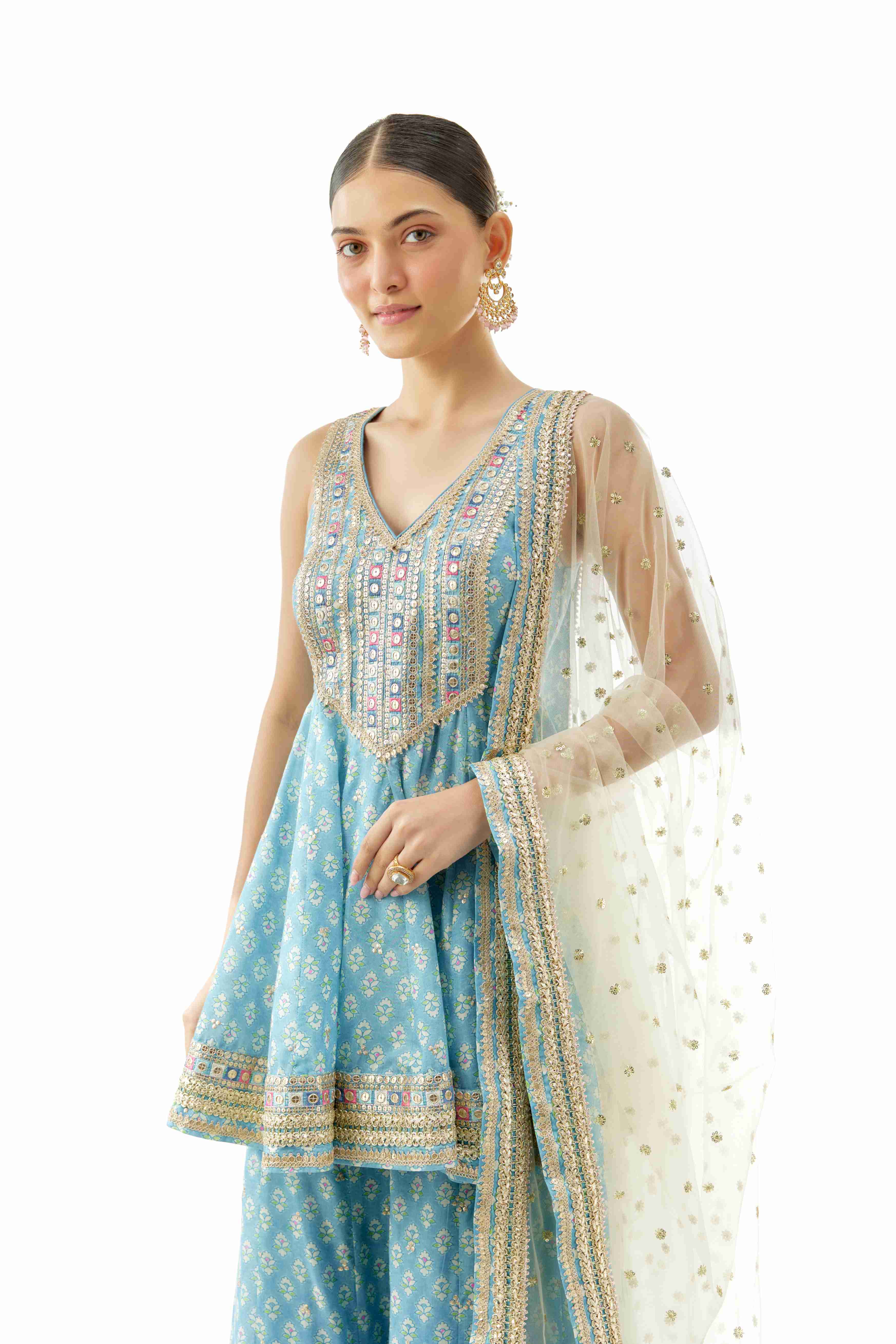 A model showcasing Simoni Blue Peplum Set by Gopi Vaid from Gopi Vaid's collection