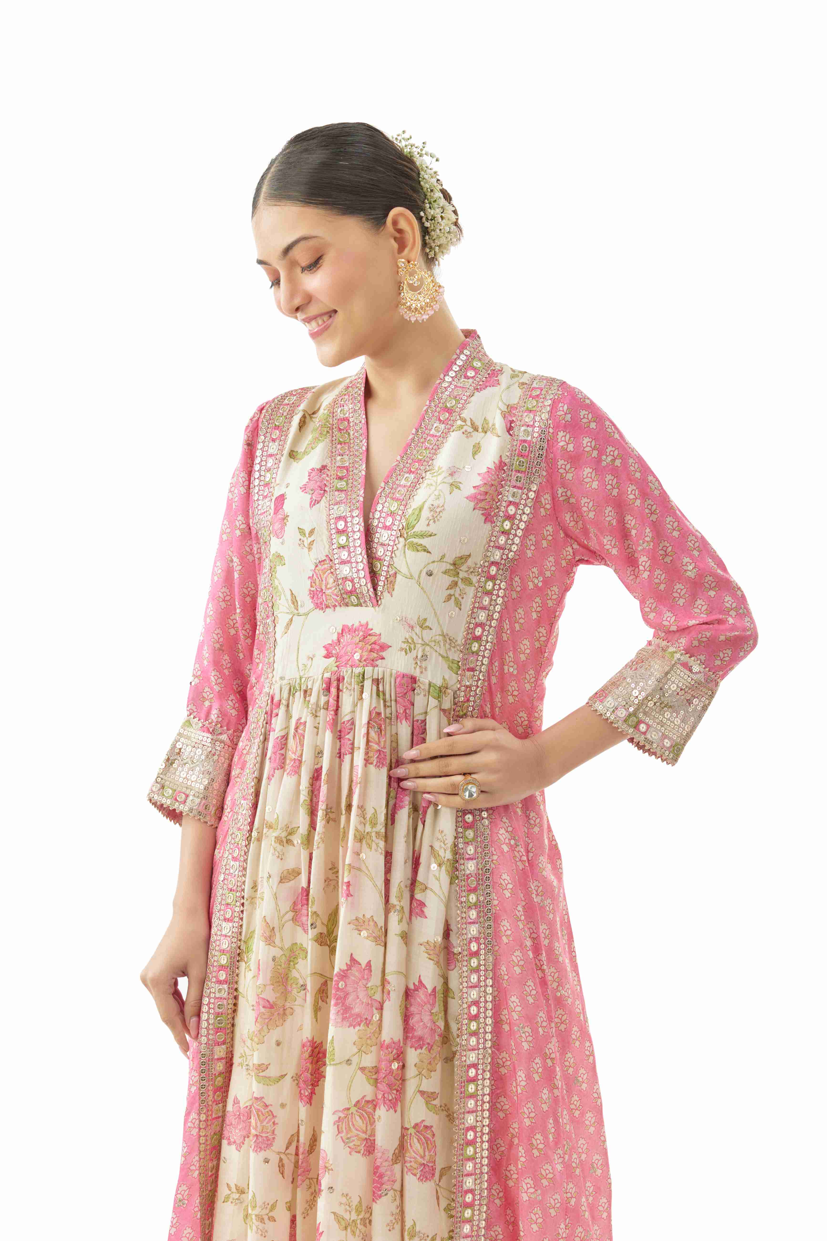A model showcasing Riya Pink Cotton Silktunic by Gopi Vaid from Gopi Vaid's collection A model showcasing Riya Pink Cotton Silktunic by Gopi Vaid from Gopi Vaid's collection