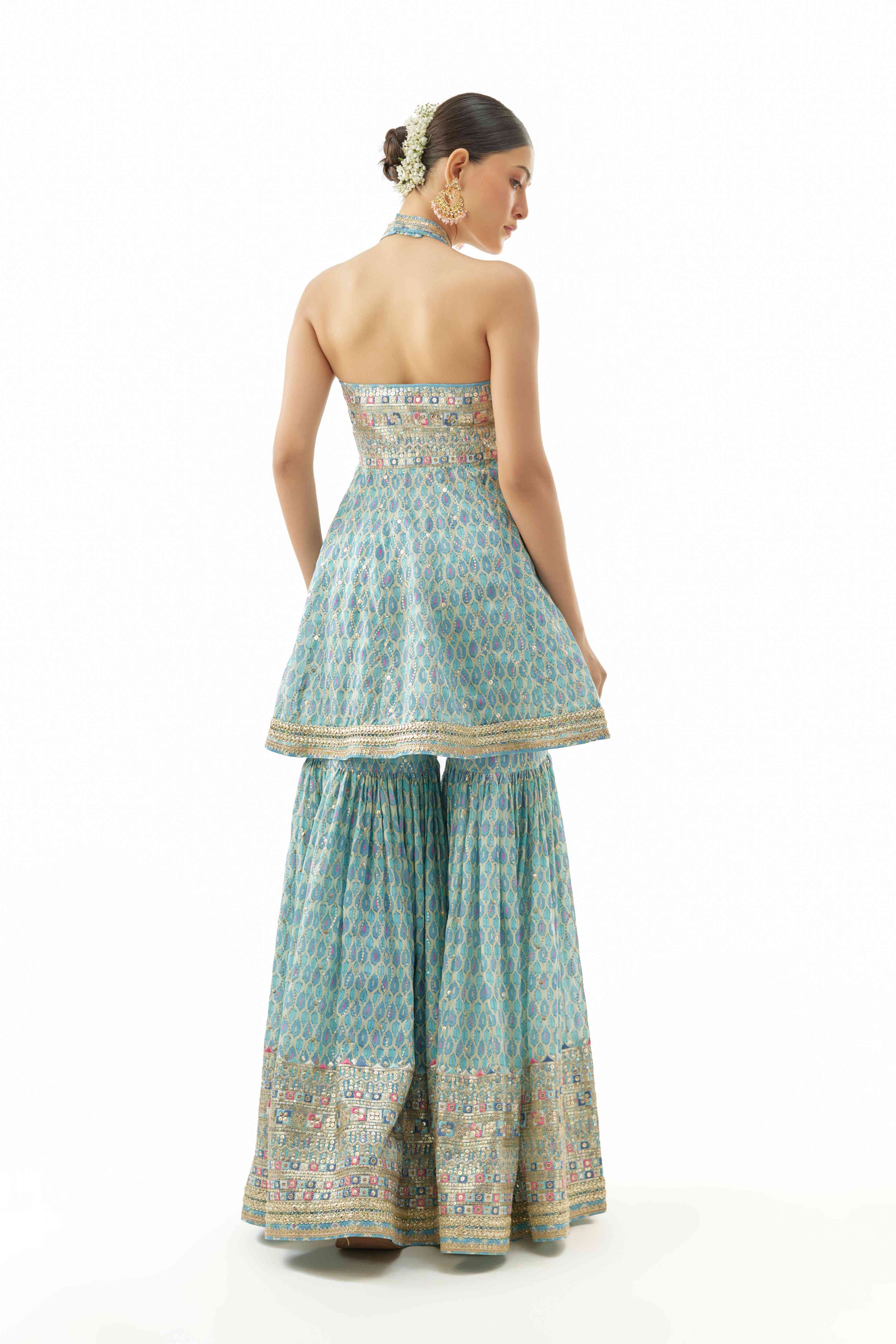 A model showcasing Janhavi Blue Peplum Set by Gopi Vaid from Gopi Vaid's collection