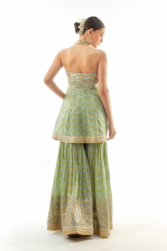 A model showcasing Janhavi Cotton Silk Peplum Set by Gopi Vaid from Gopi Vaid's collection