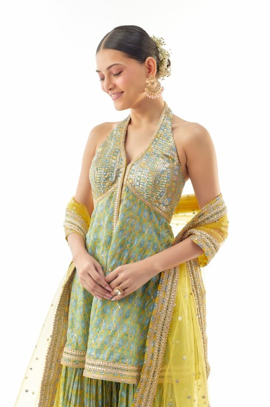 A model showcasing Janhavi Cotton Silk Peplum Set by Gopi Vaid from Gopi Vaid's collection