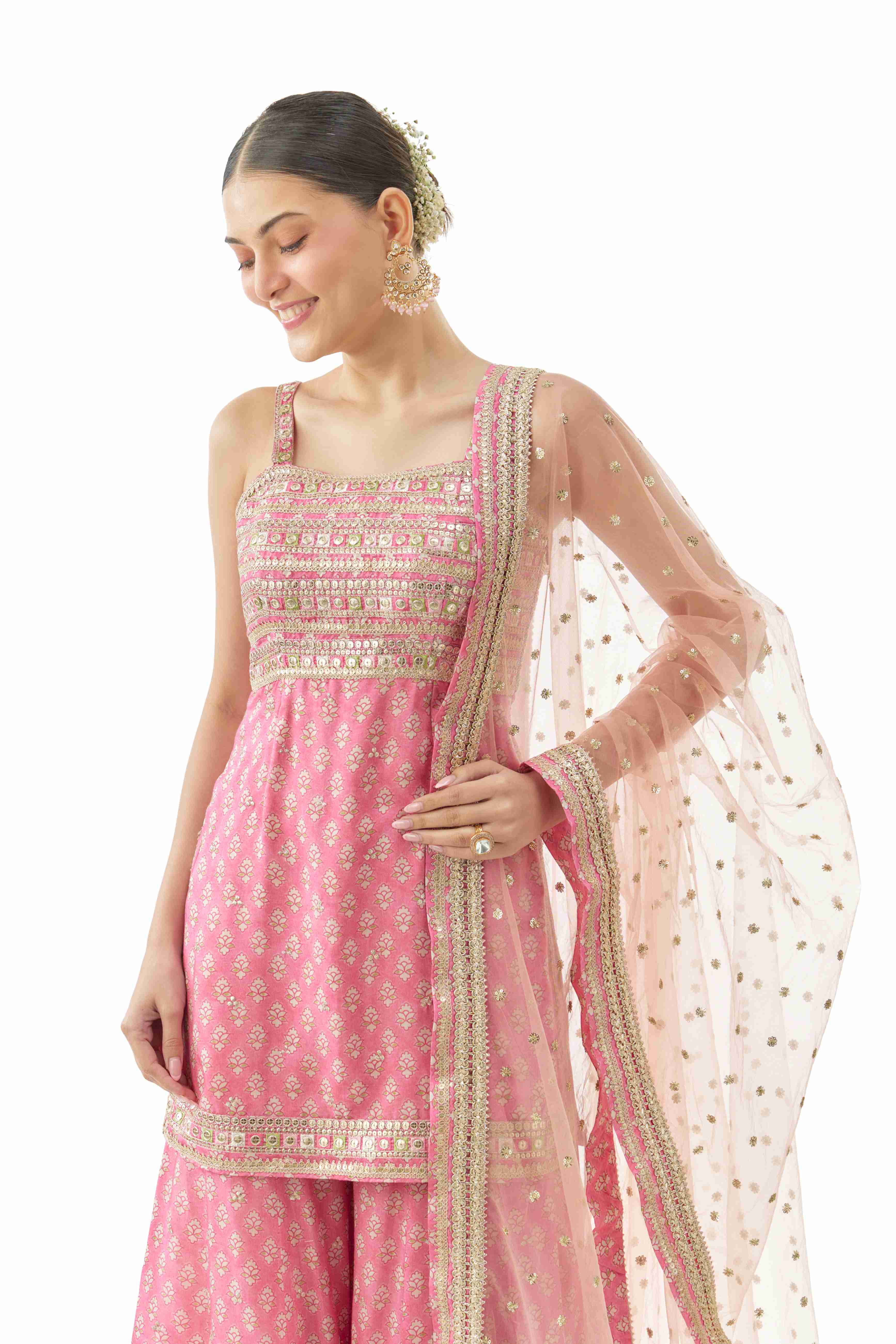 A model showcasing Nitya Pink Strappy Set by Gopi Vaid from Gopi Vaid's collection