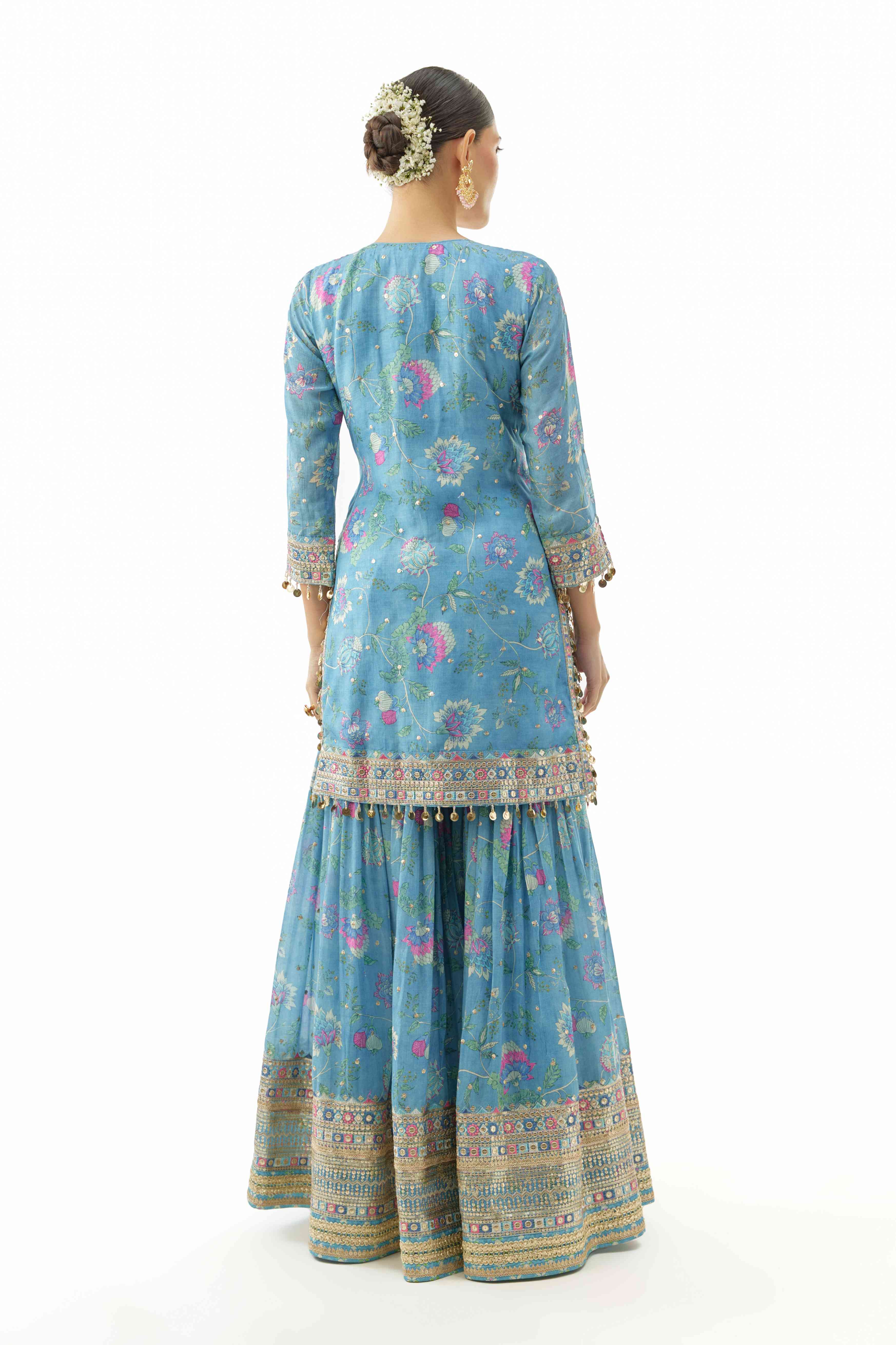 A model showcasing Niyati Cotton Silk Sharara Set by Gopi Vaid from Gopi Vaid's collection