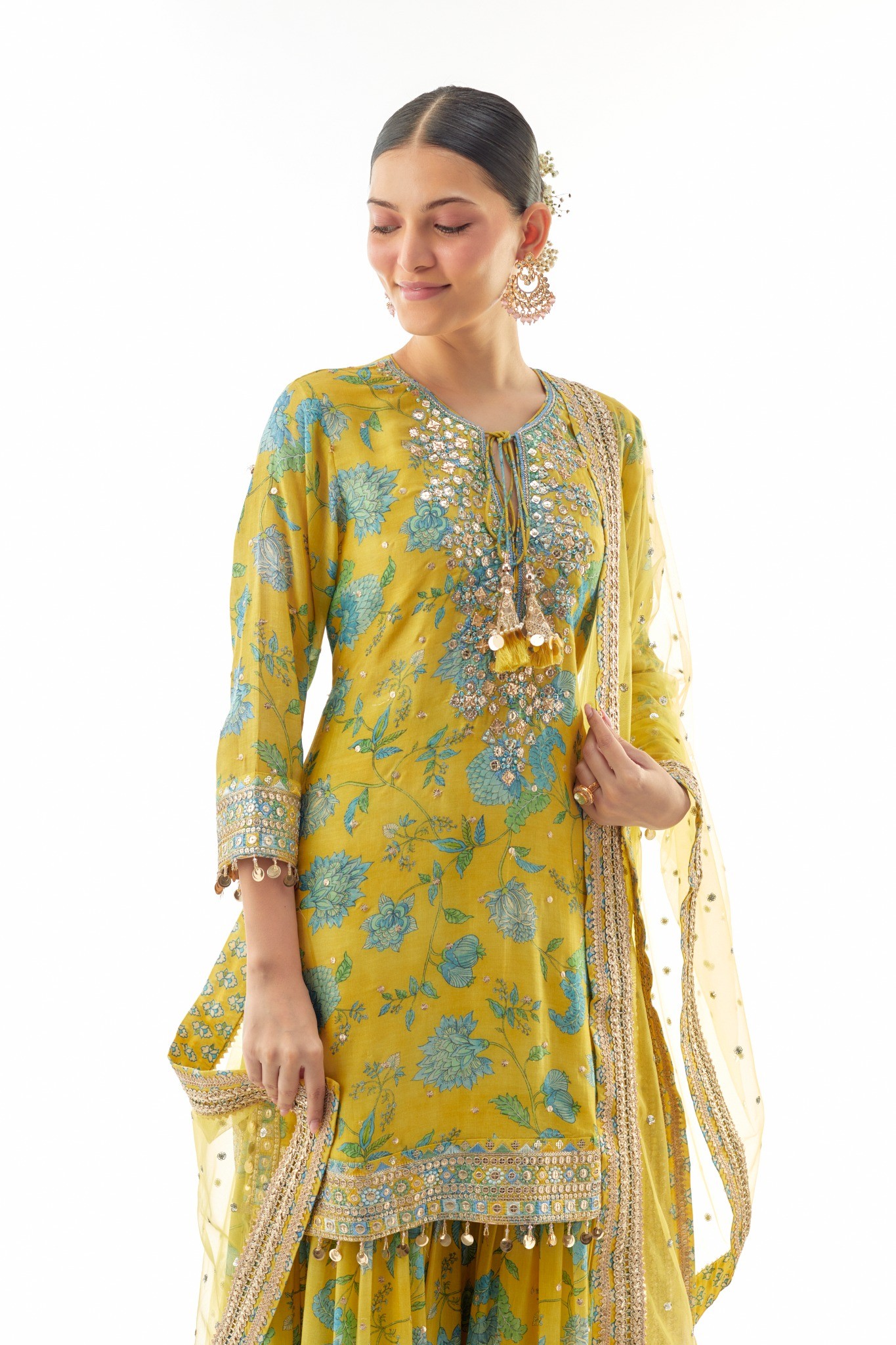 A model showcasing Niyati Yellow Sharara Set by Gopi Vaid from Gopi Vaid's collection