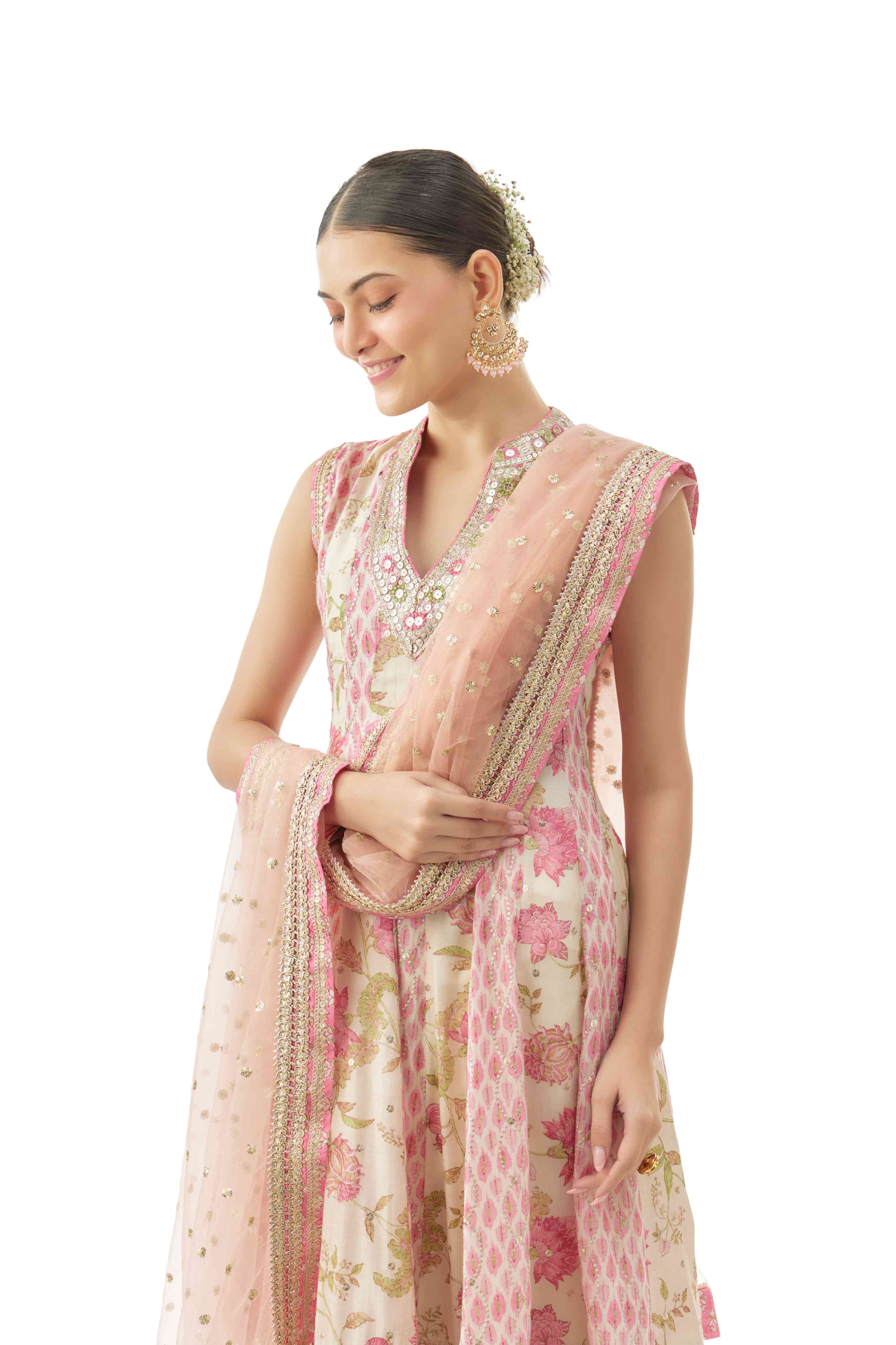 A model showcasing Smriti Ivory Dhoti Set by Gopi Vaid from Gopi Vaid's collection