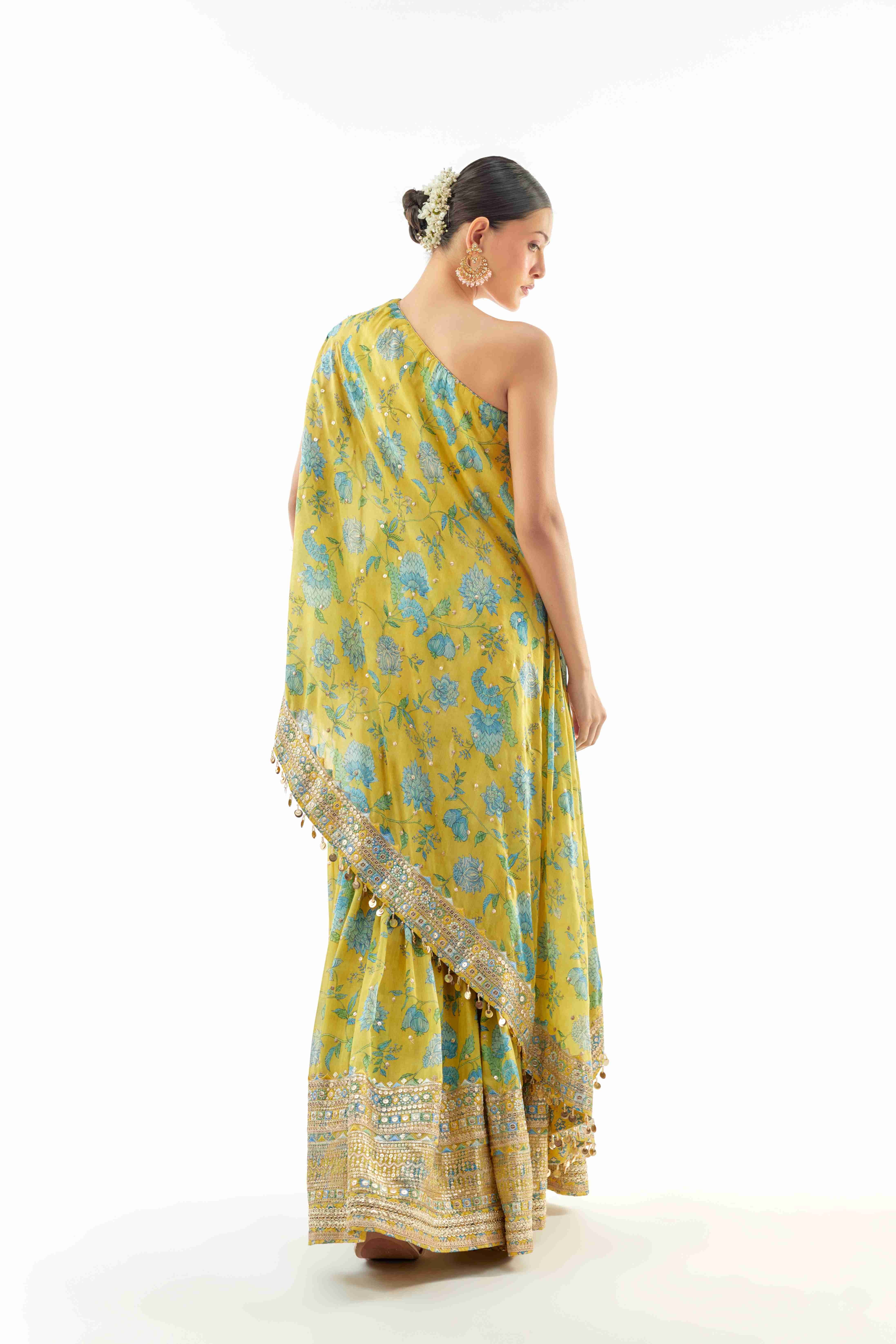 A model showcasing Sumedha One Shoulder Sharara Set by Gopi Vaid from Gopi Vaid's collection