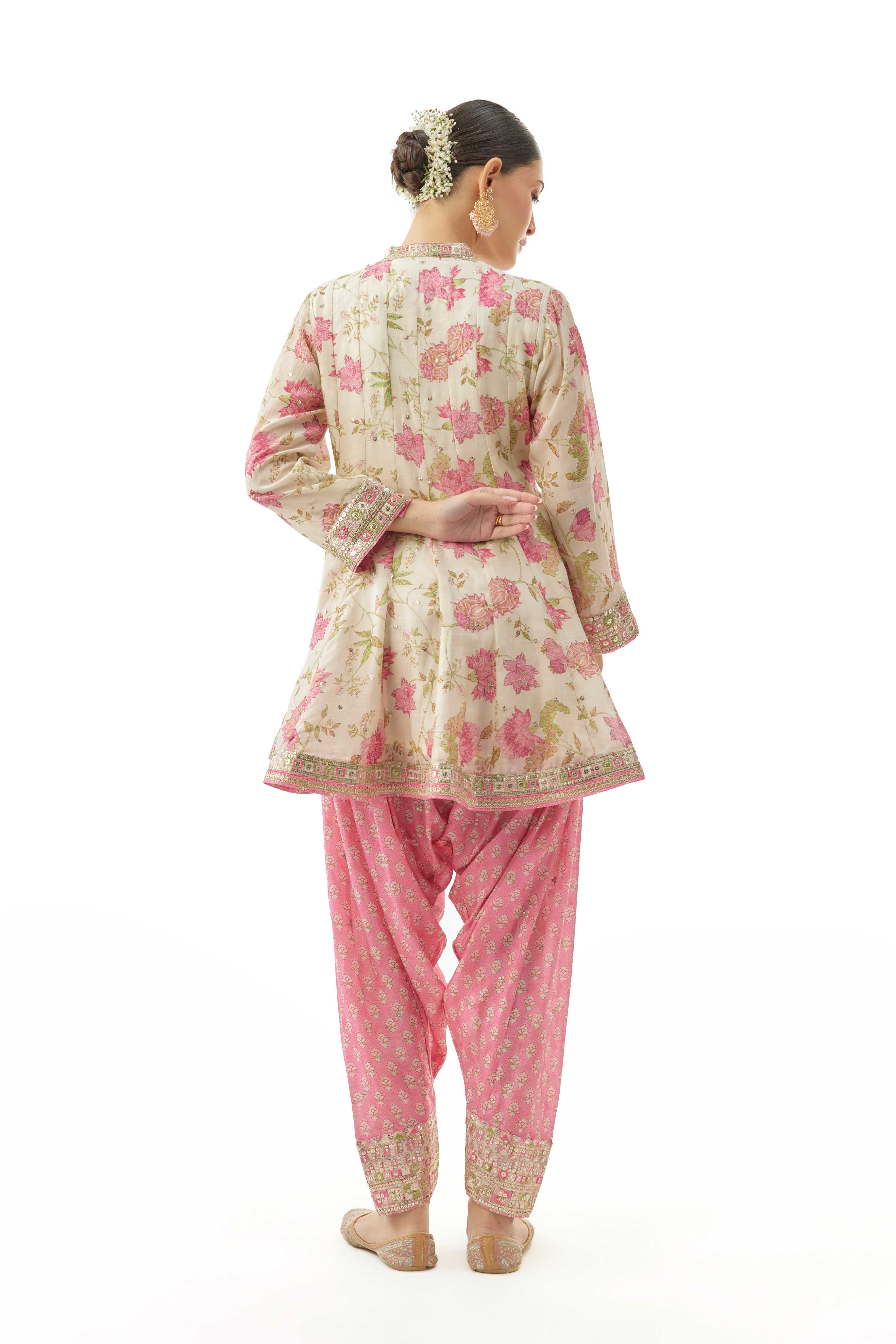 A model showcasing Priyagini Pink Ag Set by Gopi Vaid from Gopi Vaid's collection