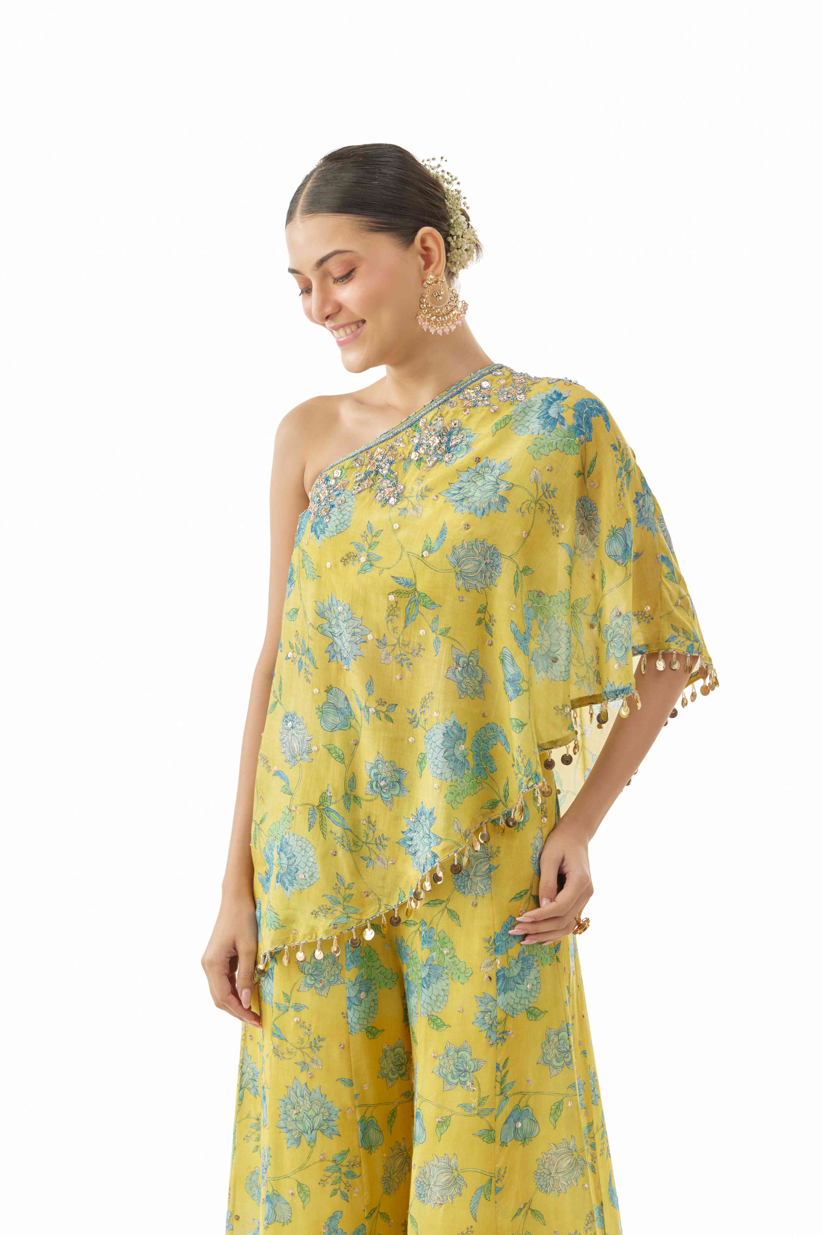 A model showcasing Vanshita One Shoulder Set by Gopi Vaid from Gopi Vaid's collection