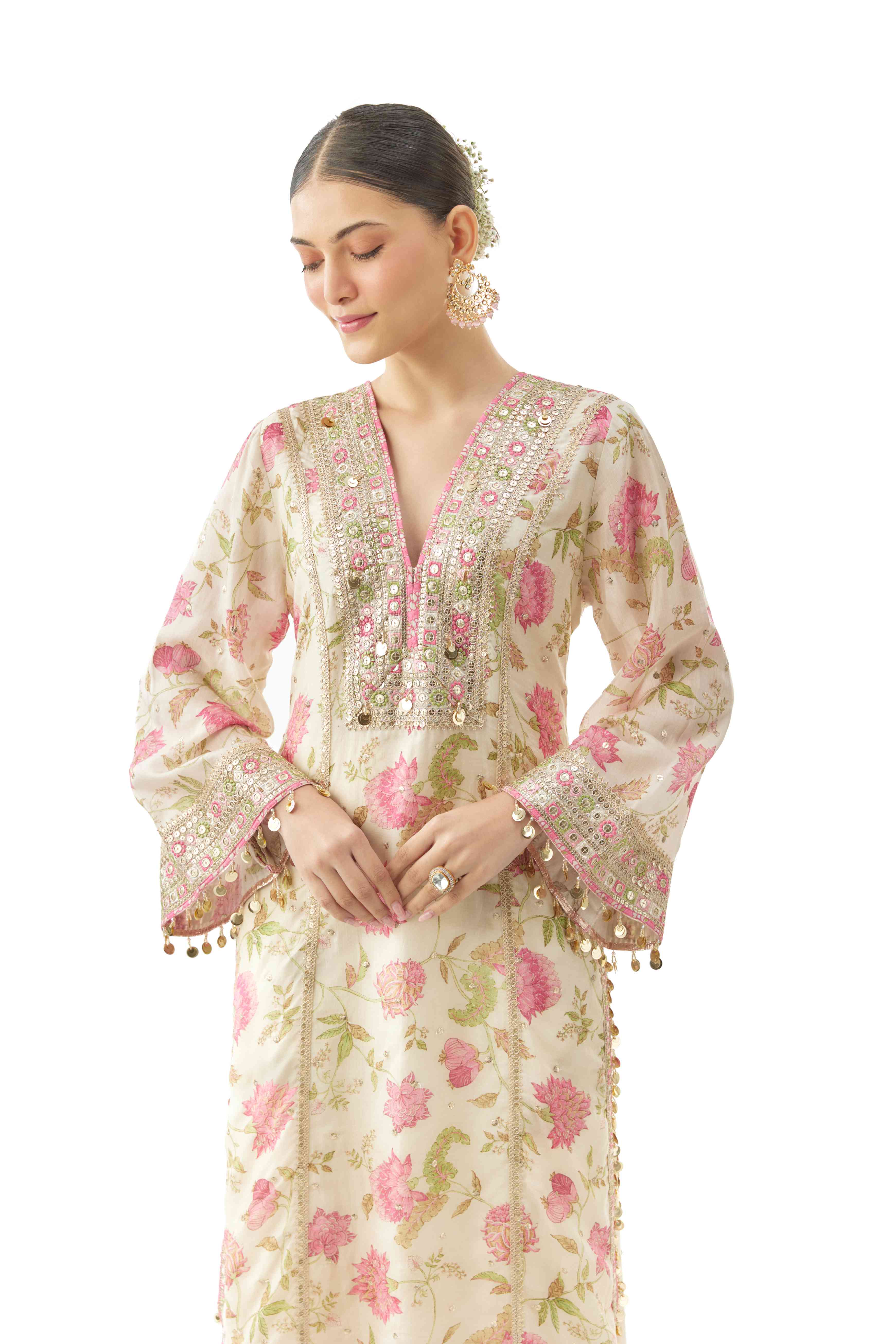 A model showcasing Kavya Ivory Tunic by Gopi Vaid from Gopi Vaid's collection