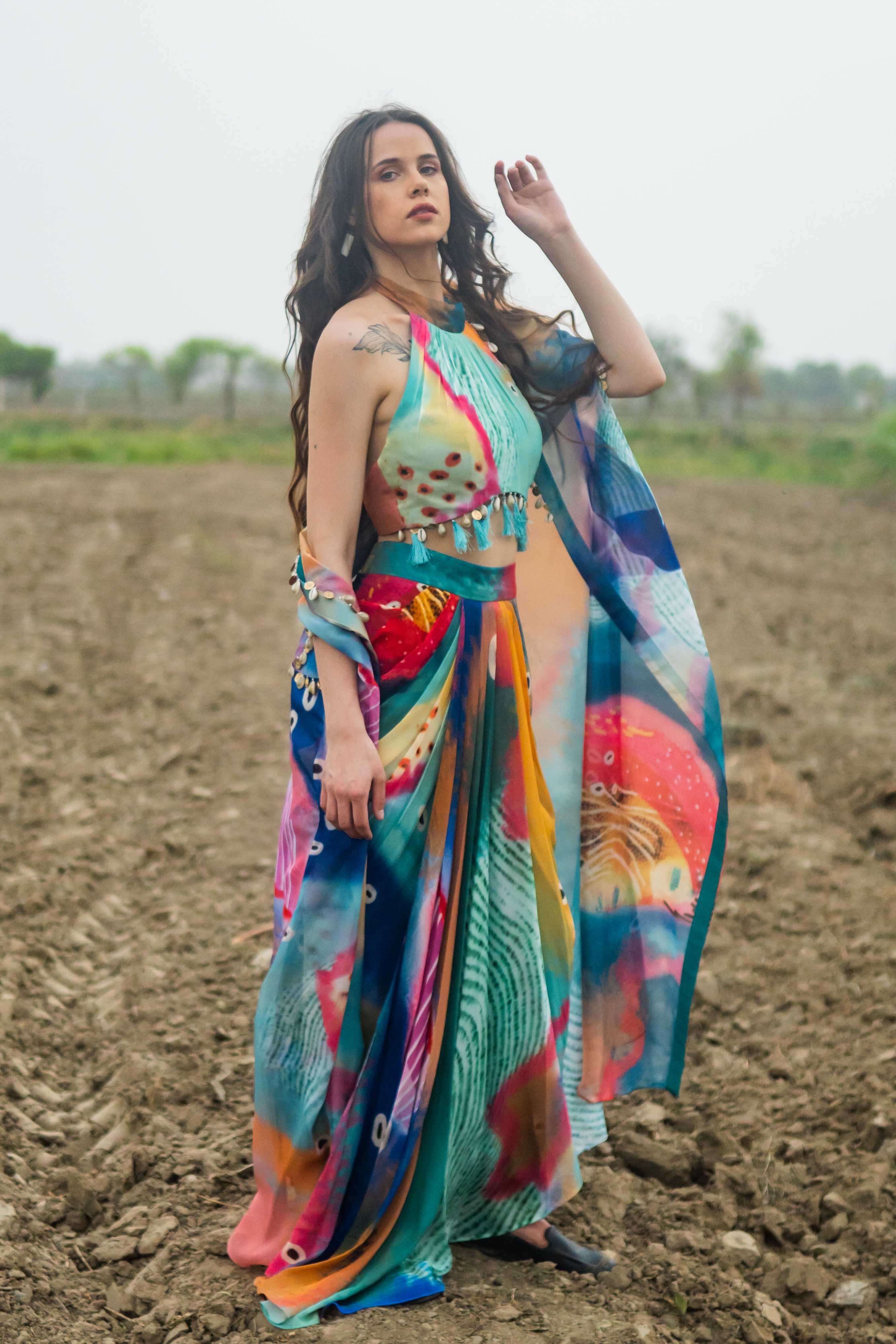 A model showcasing Boheme Daze Cape Set by Miku Kumar from Miku Kumar's collection