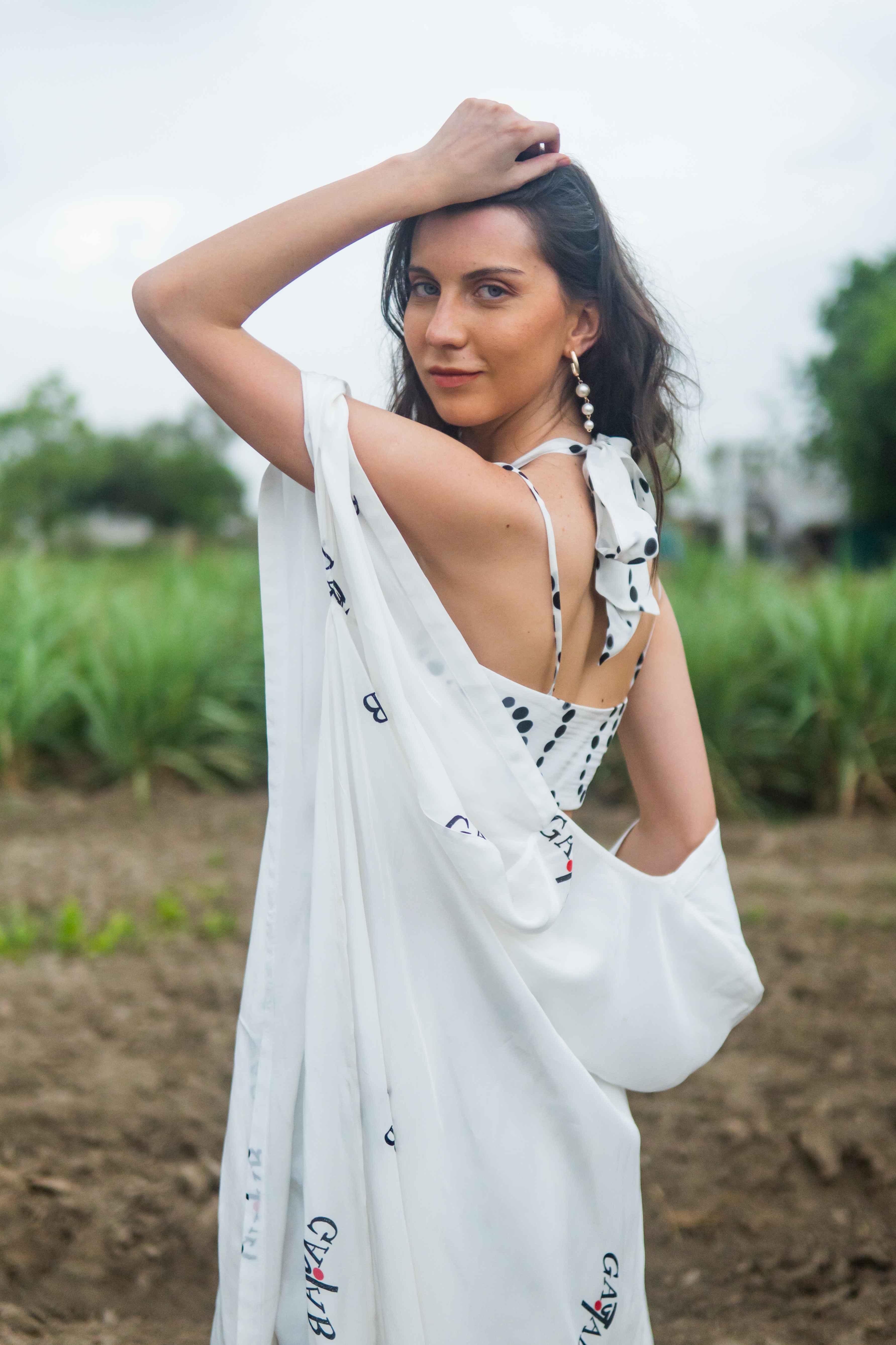 A model showcasing Soul Caravan Cape Set by Miku Kumar from Miku Kumar's collection