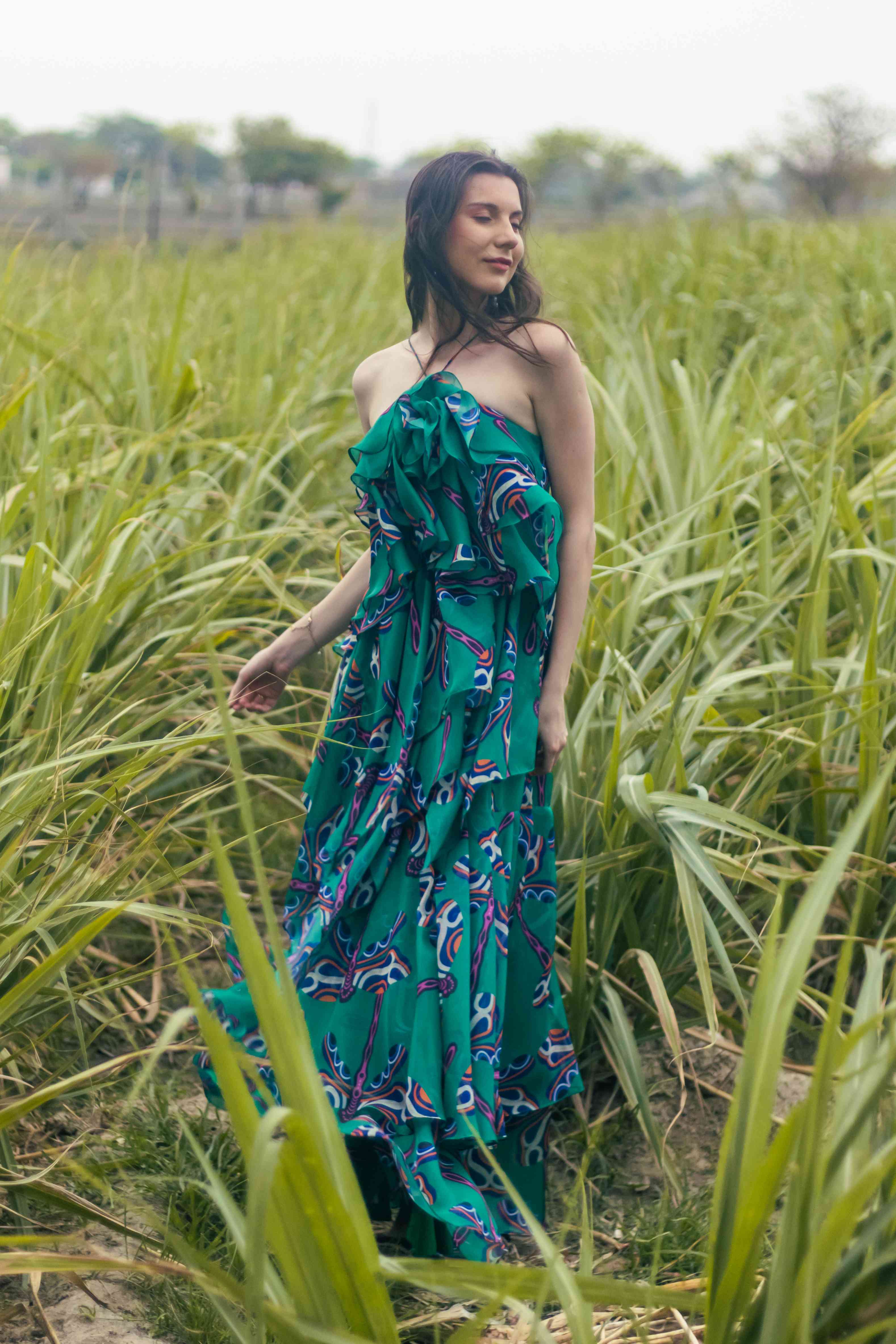 A model showcasing Lush Cabana Maxi Dress by Miku Kumar from Miku Kumar's collection