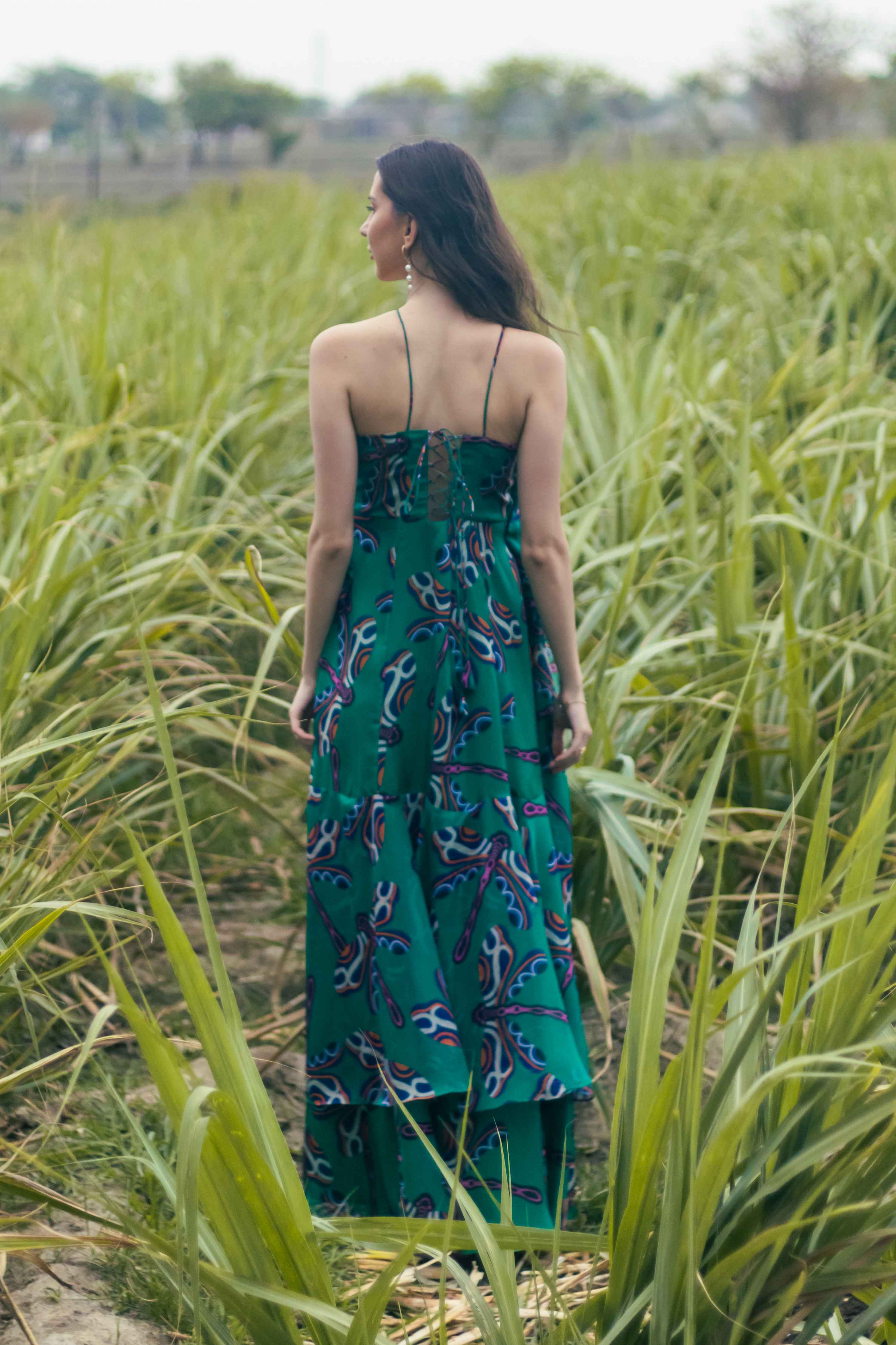 A model showcasing Lush Cabana Maxi Dress by Miku Kumar from Miku Kumar's collection