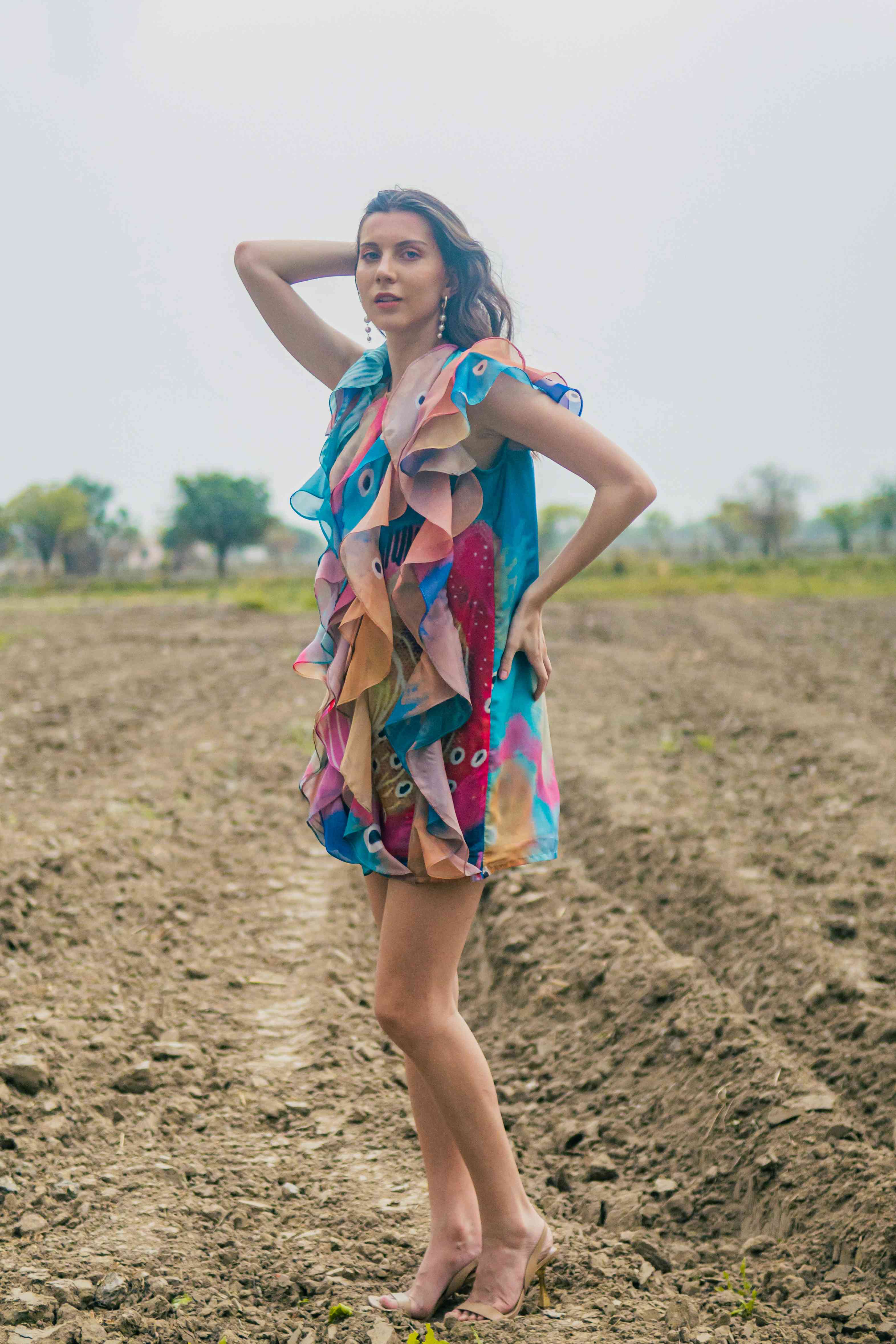 A model showcasing Sunspell Nomad Dress by Miku Kumar from Miku Kumar's collection