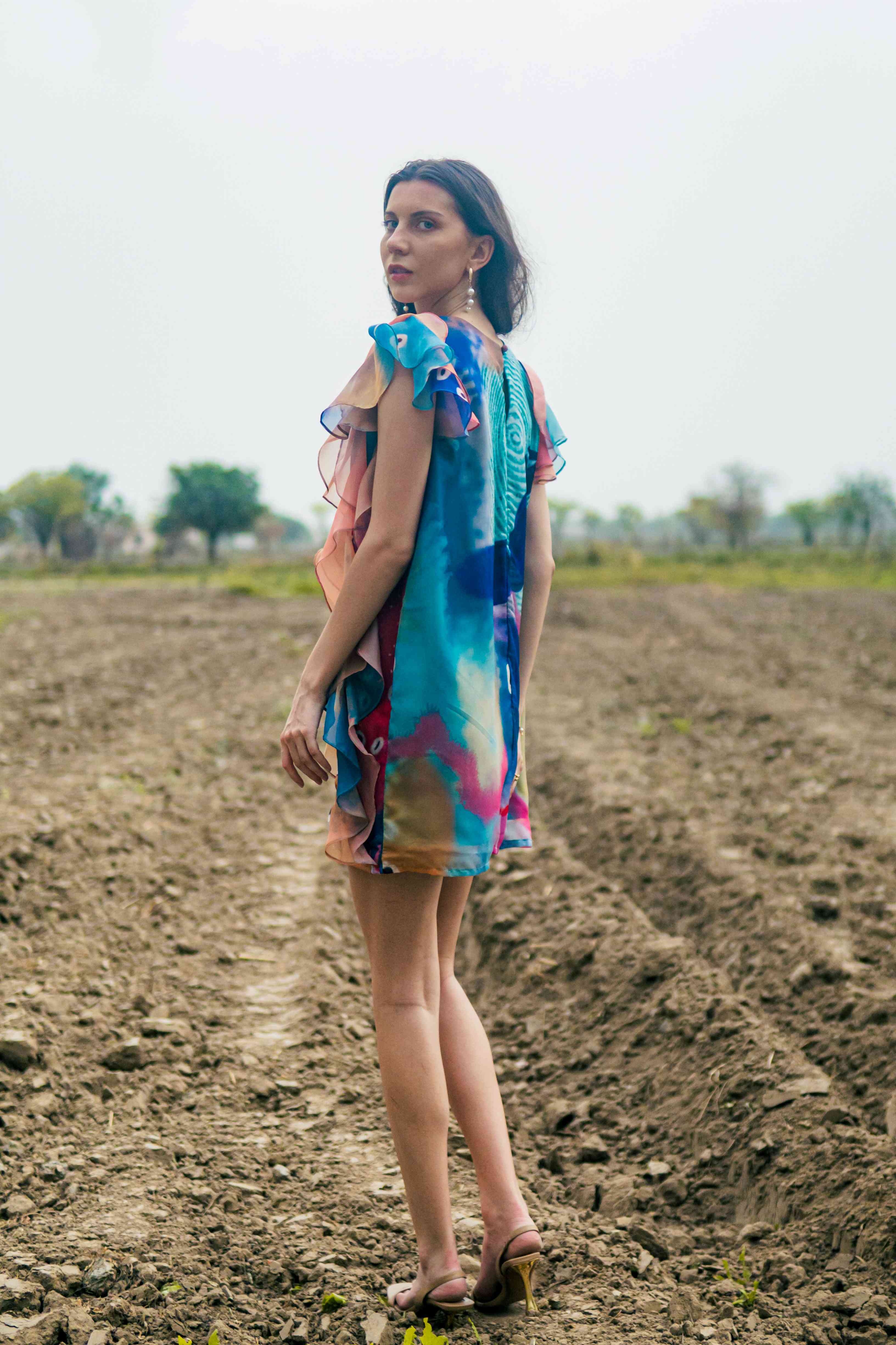 A model showcasing Sunspell Nomad Dress by Miku Kumar from Miku Kumar's collection