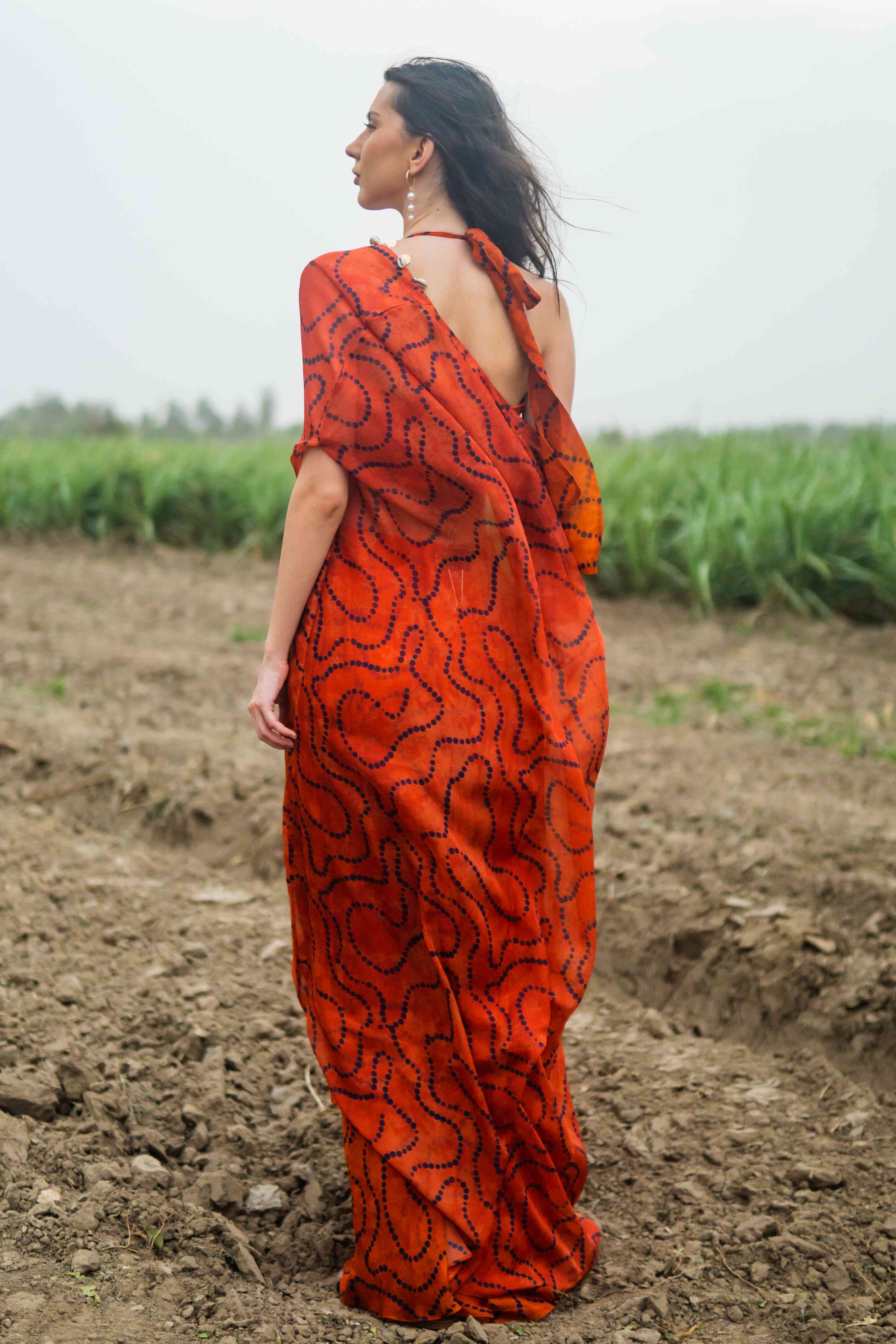 A model showcasing Gypsy Moonrise Kaftan Dress by Miku Kumar from Miku Kumar's collection
