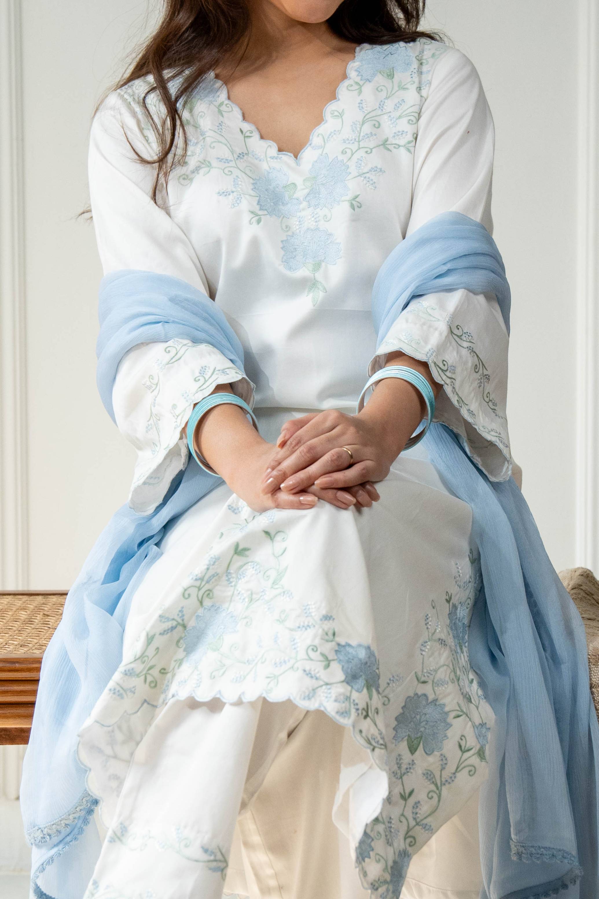 A model showcasing Mogra White Kurta Set by Gaamya from Gaamya's collection