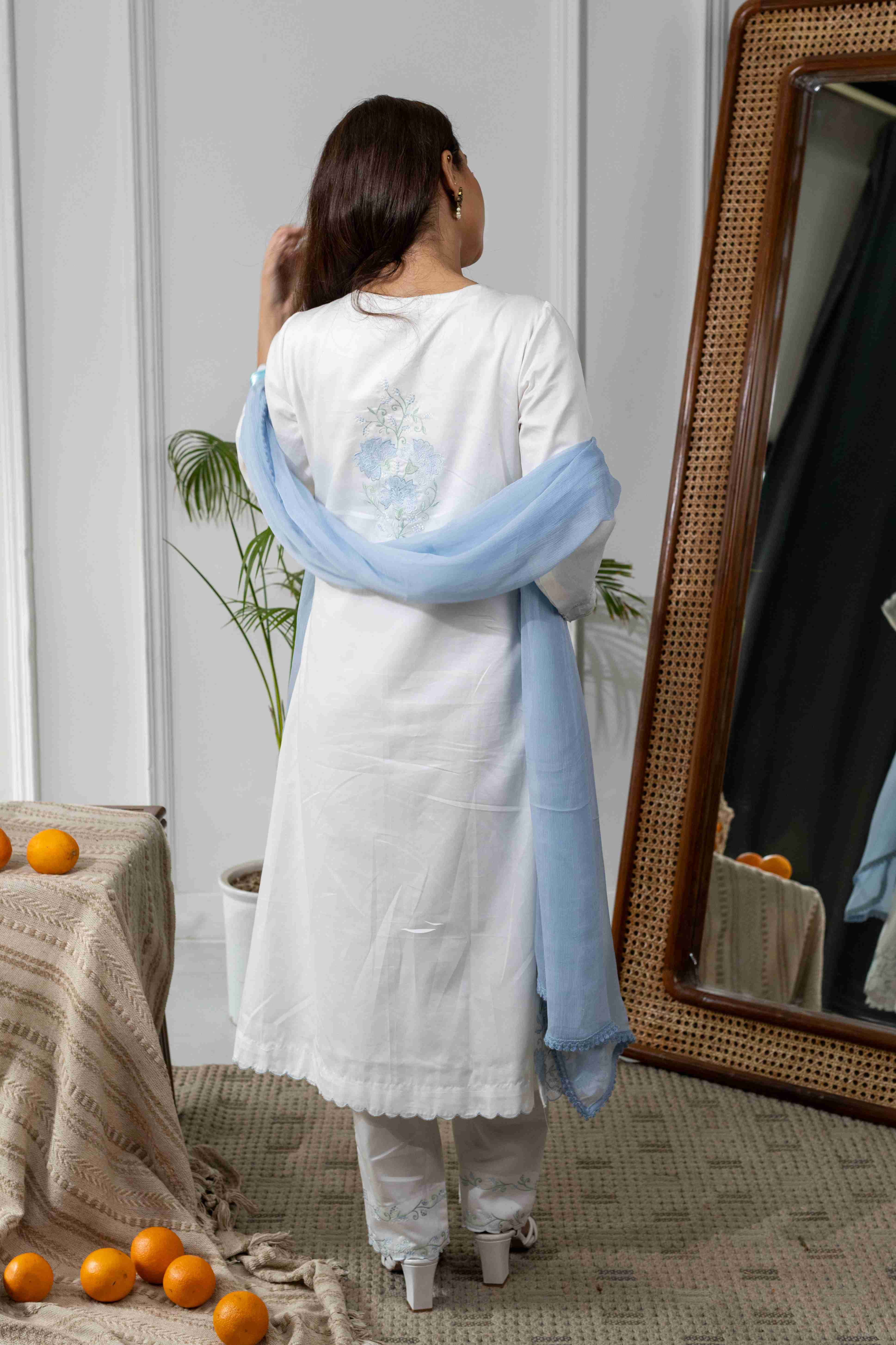 A model showcasing Mogra White Kurta Set by Gaamya from Gaamya's collection
