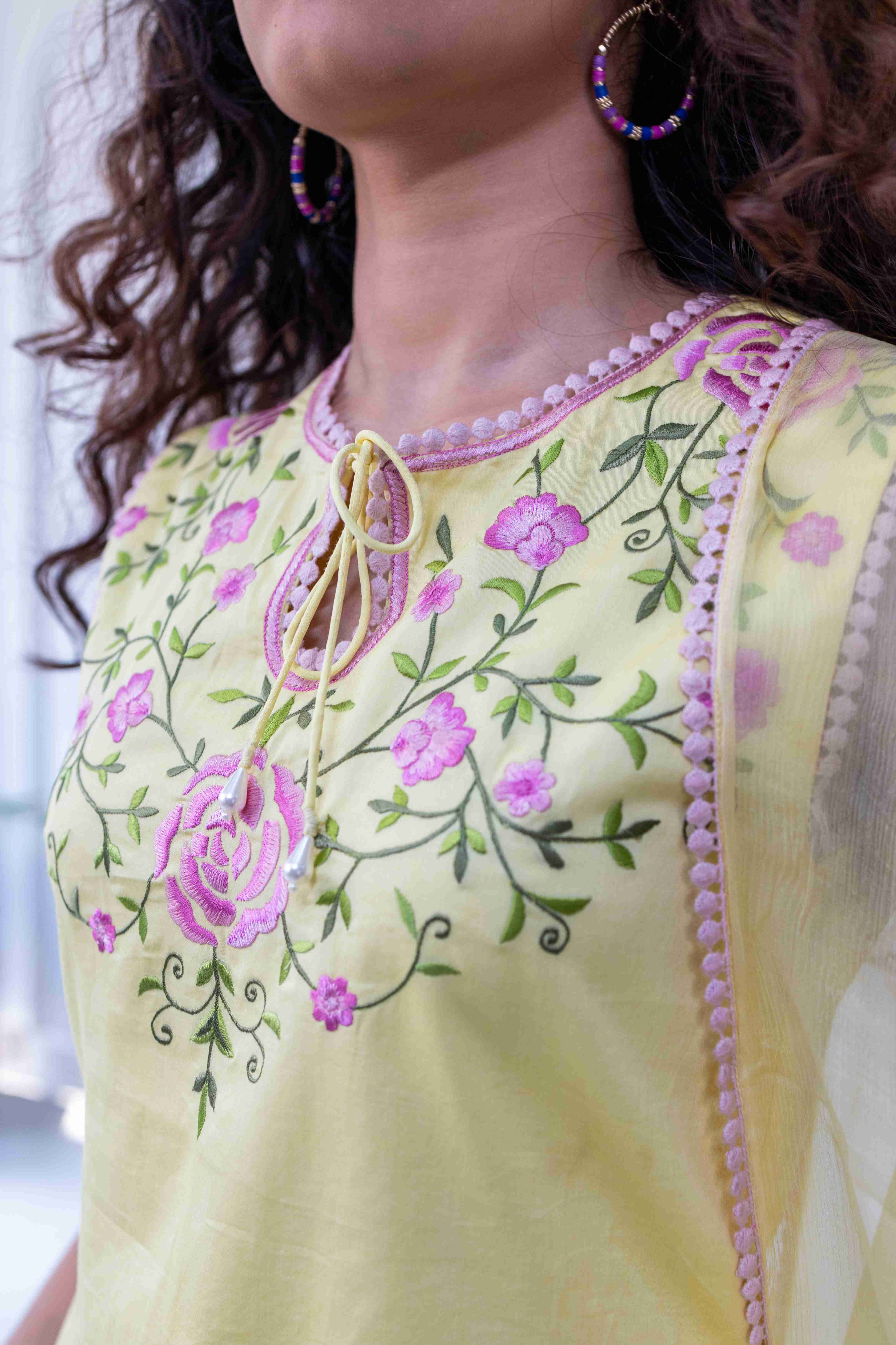 A model showcasing Surajmukhi Yellow Kurta Suit by Gaamya from Gaamya's collection
