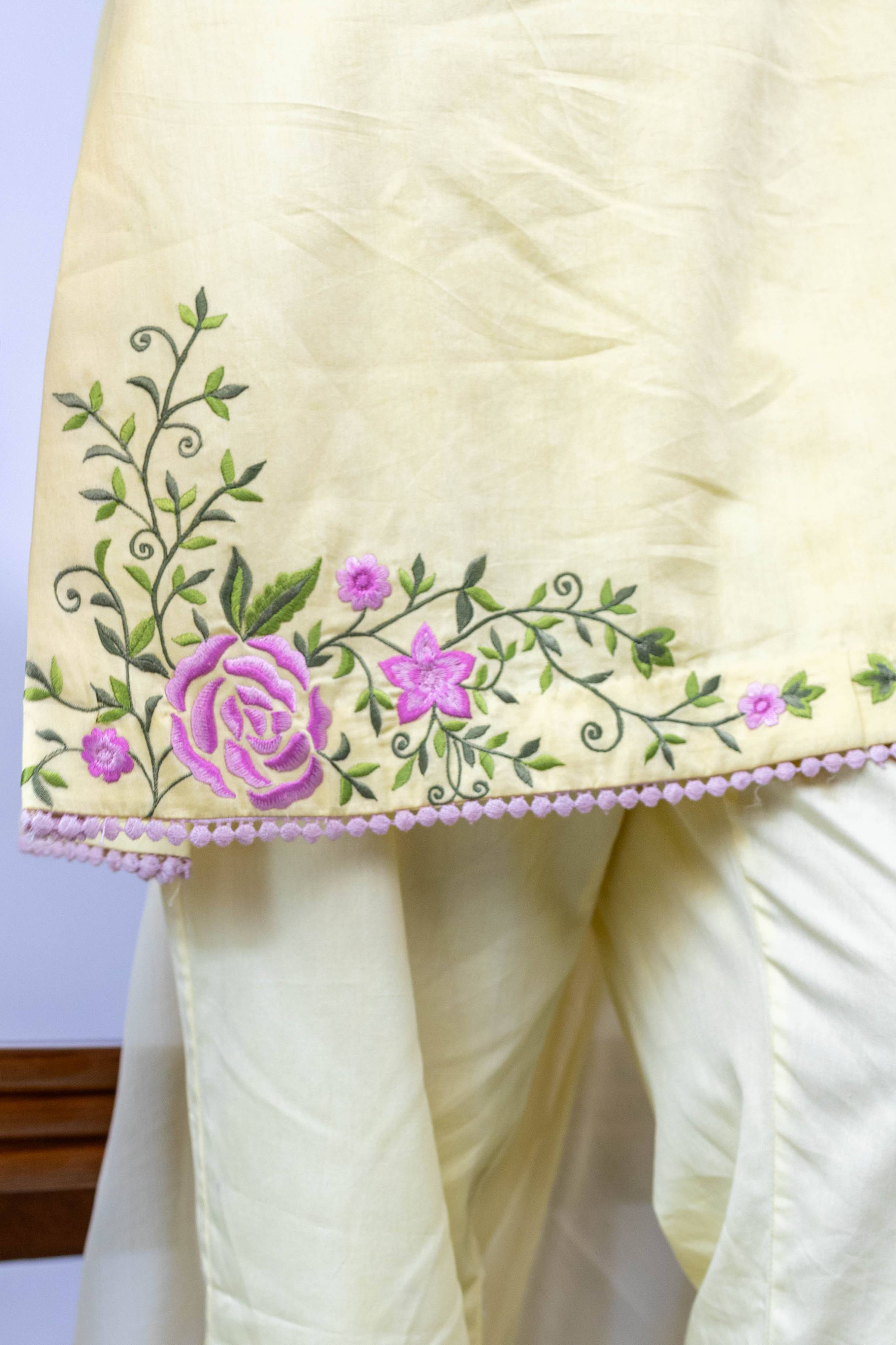 A model showcasing Surajmukhi Yellow Kurta Suit by Gaamya from Gaamya's collection