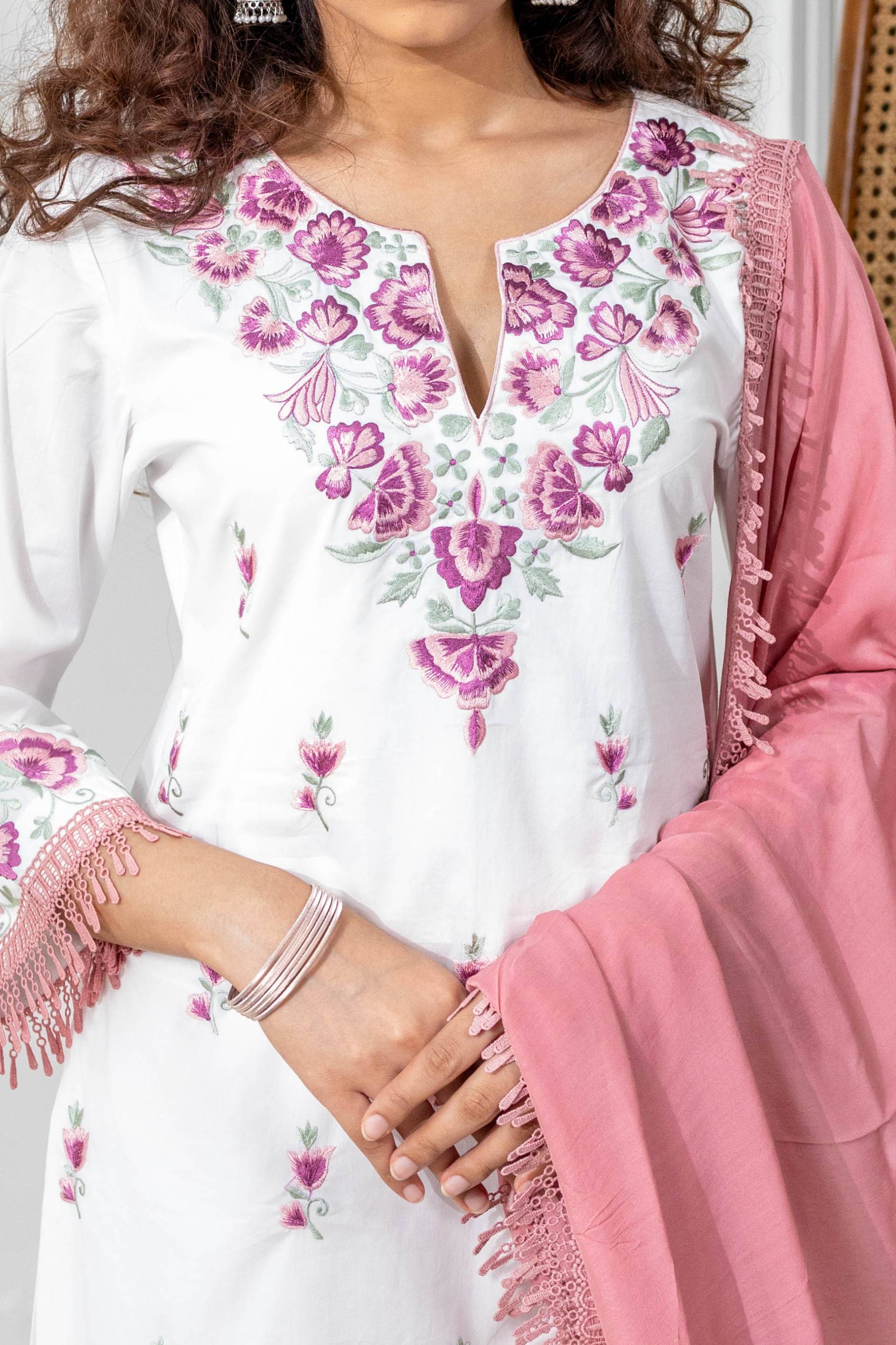 A model showcasing Palash White Pink Kurta Set by Gaamya from Gaamya's collection