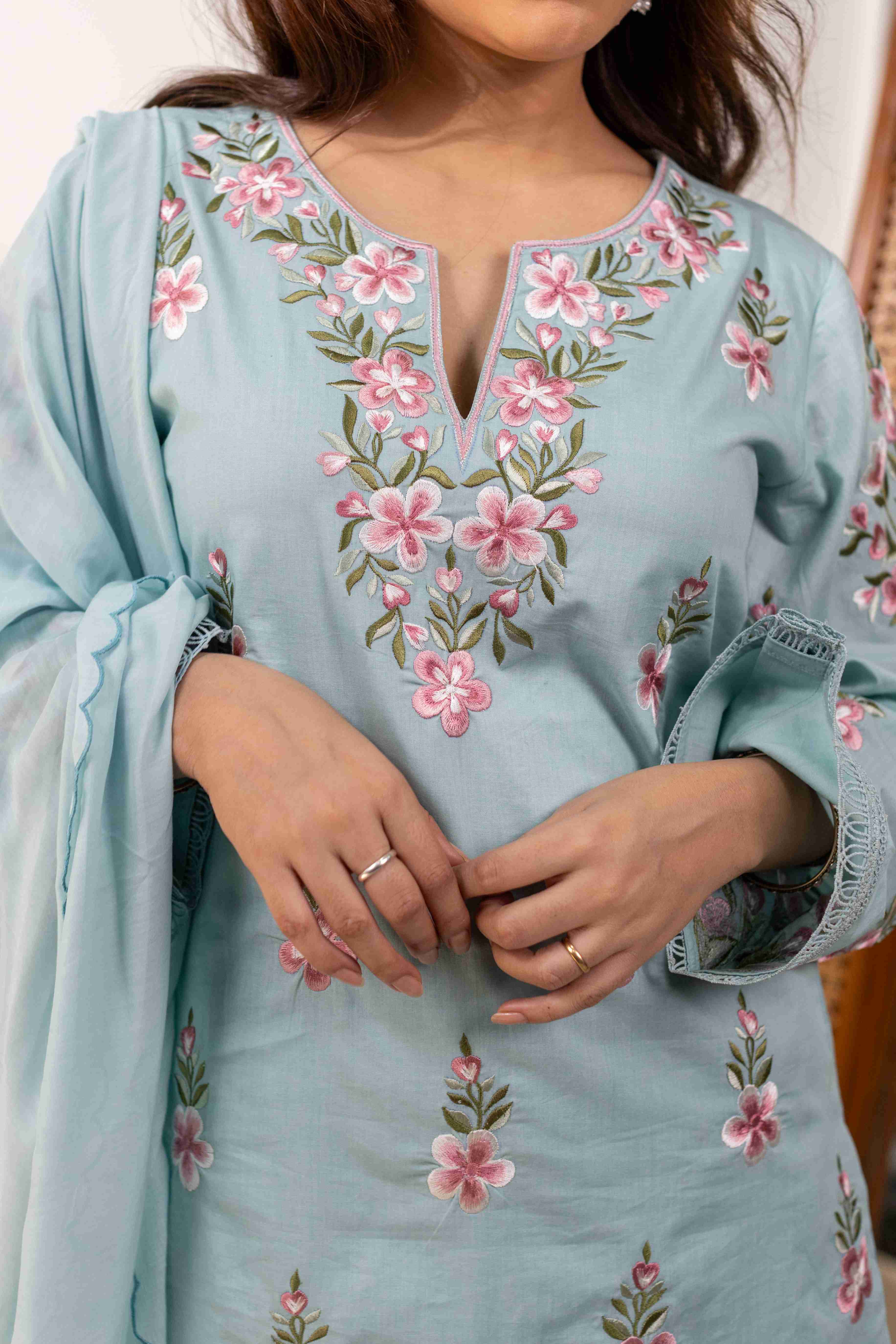 A model showcasing Tulsi Ferozi Straight Suit Set by Gaamya from Gaamya's collection