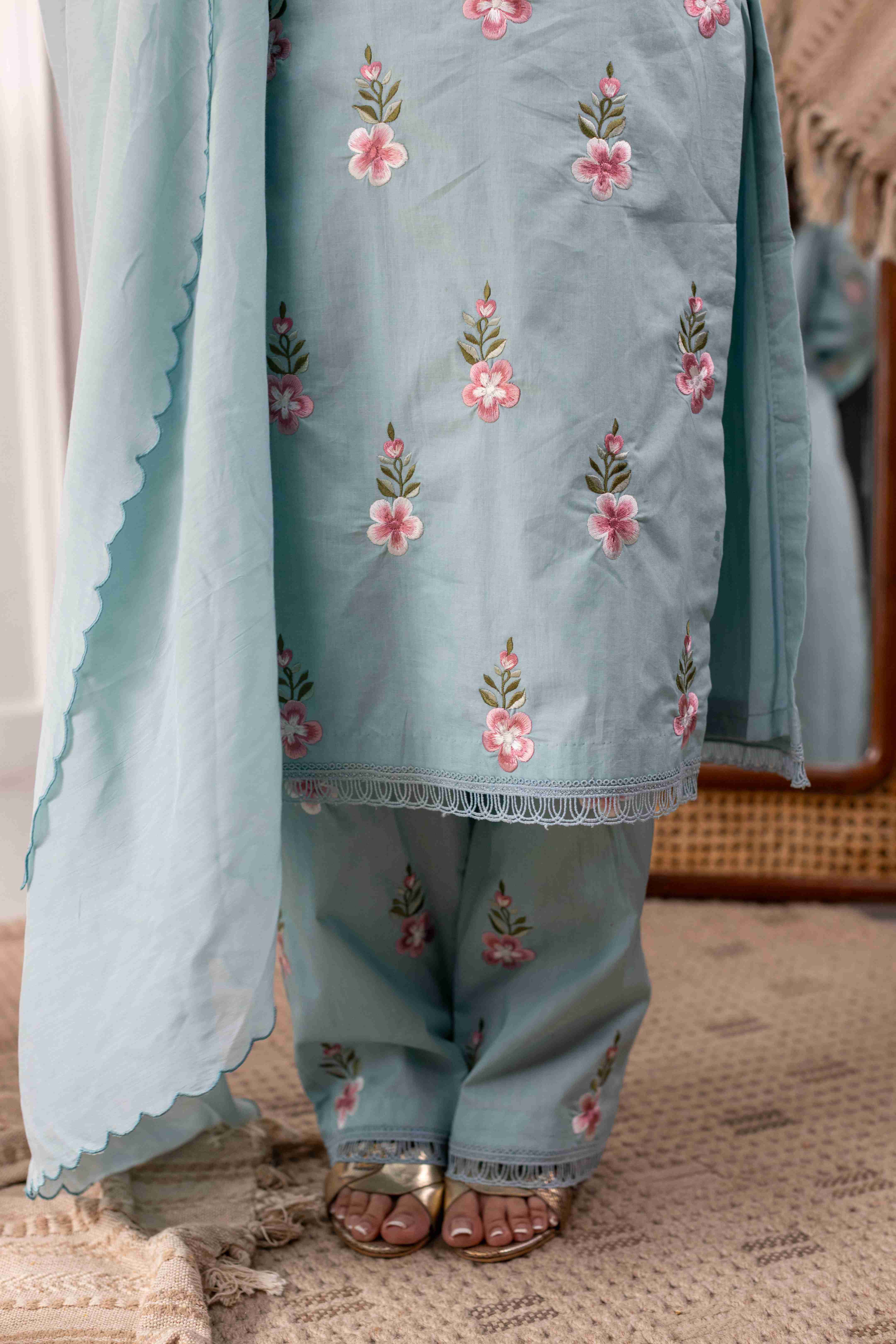 A model showcasing Tulsi Ferozi Straight Suit Set by Gaamya from Gaamya's collection