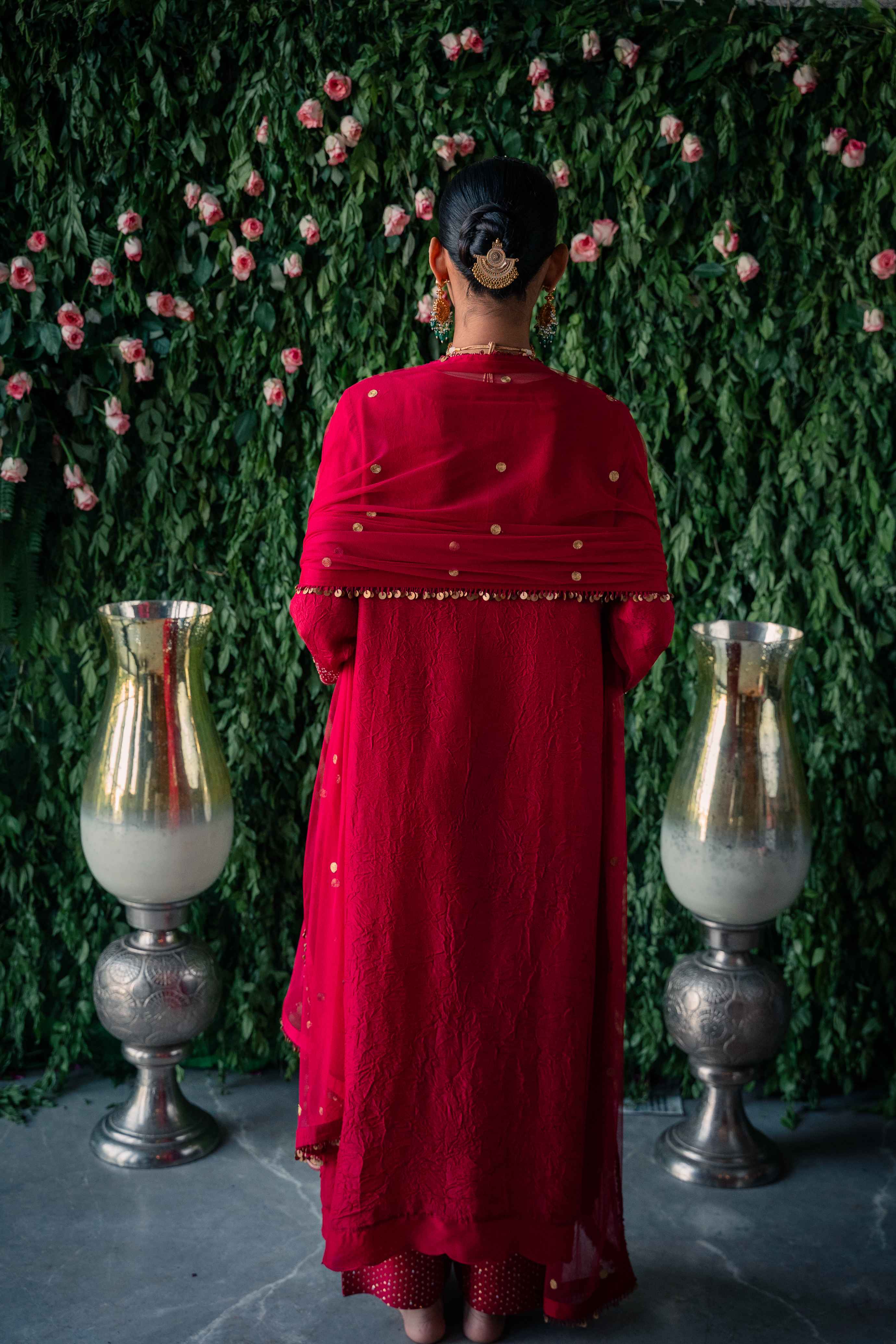 A model showcasing Red Silk Kurta Set by Pooja Singhal from Pooja Singhal's collection