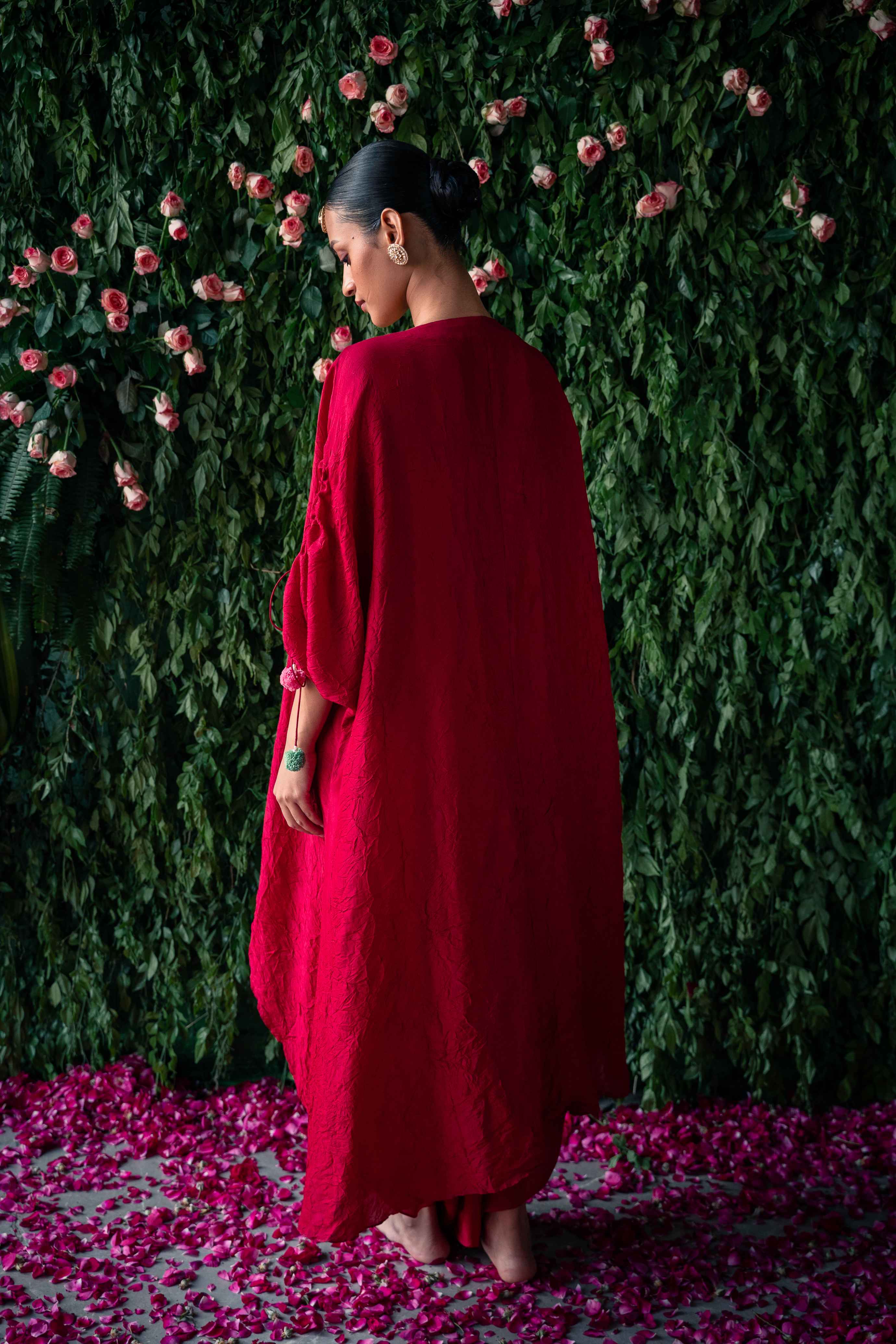 A model showcasing Red Indowestern Kaftan Kurta Set by Pooja Singhal from Pooja Singhal's collection