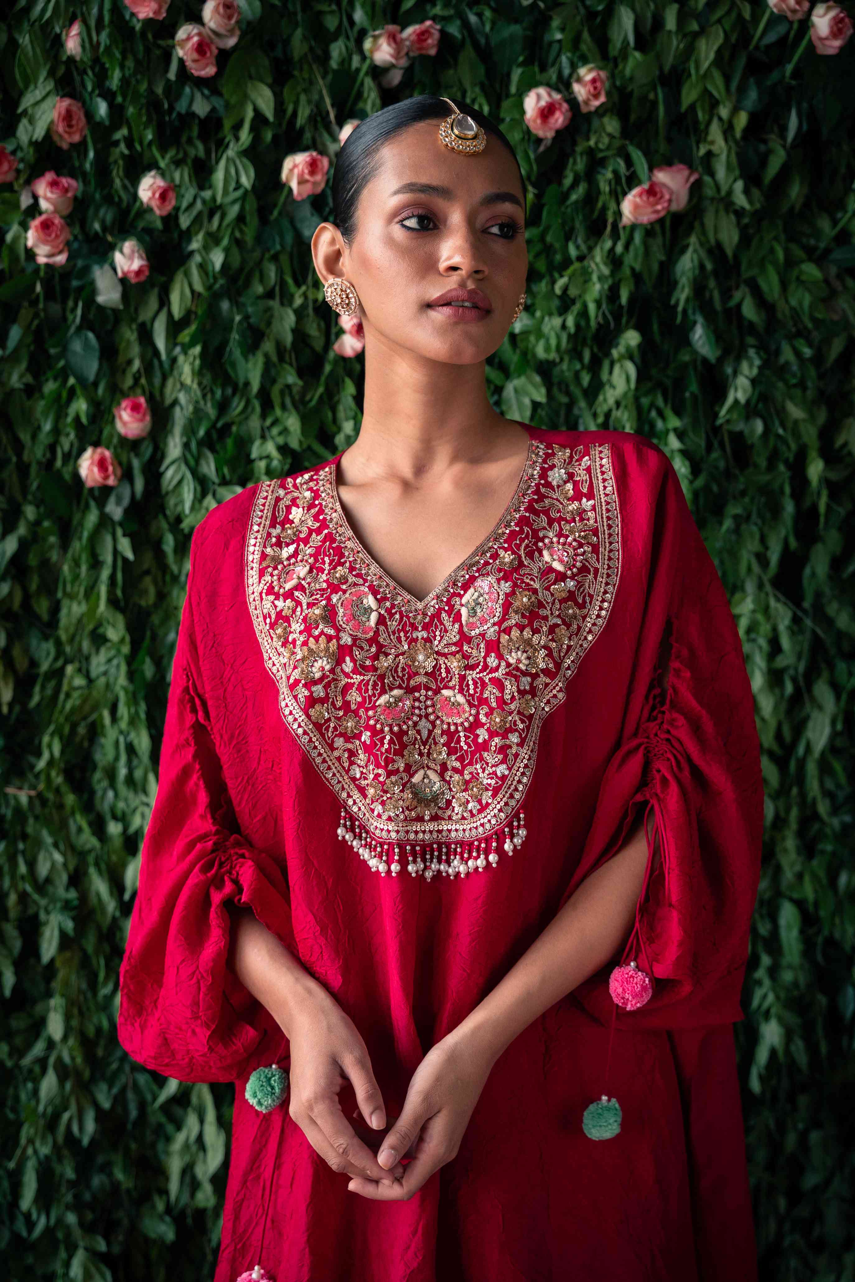 A model showcasing Red Indowestern Kaftan Kurta Set by Pooja Singhal from Pooja Singhal's collection