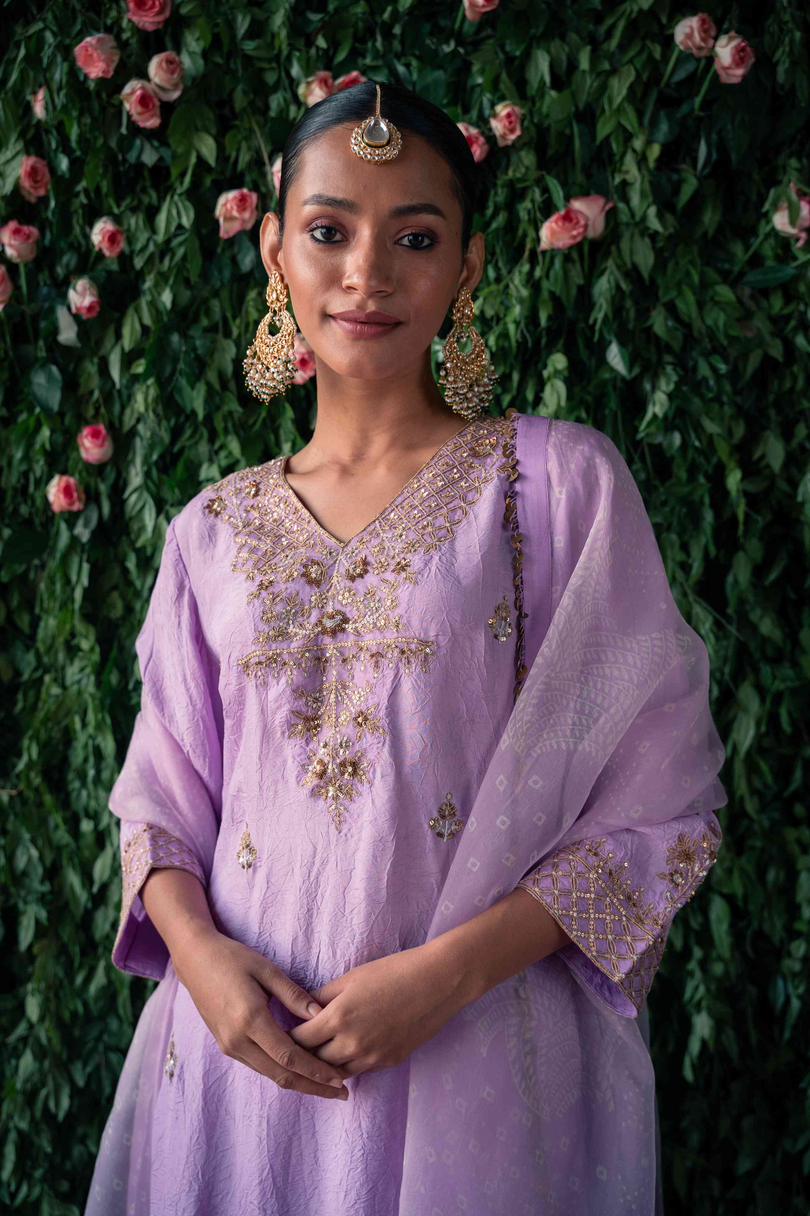A model showcasing Lavender Phool Silk Kurta Set by Pooja Singhal from Pooja Singhal's collection