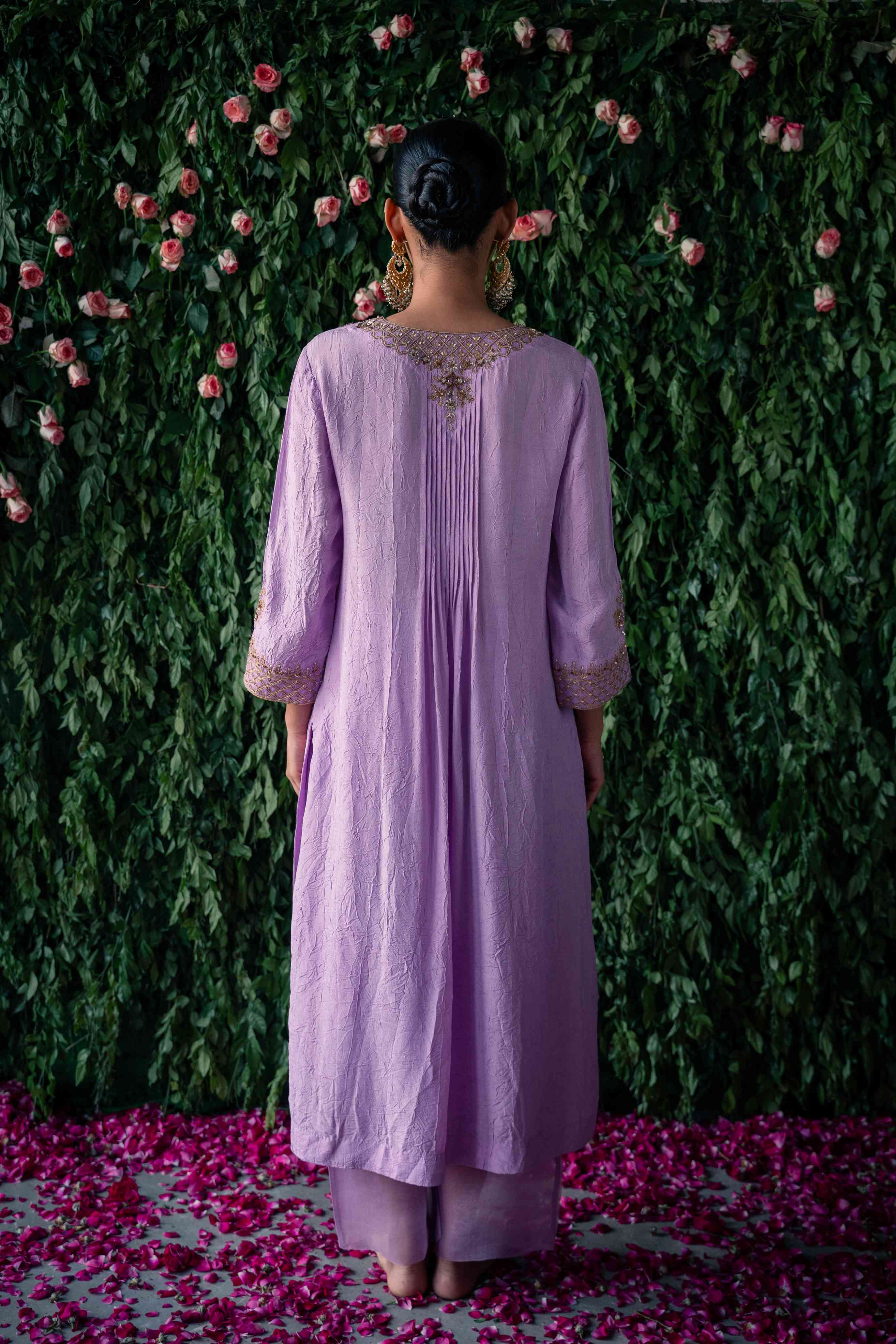 A model showcasing Lavender Phool Silk Kurta Set by Pooja Singhal from Pooja Singhal's collection