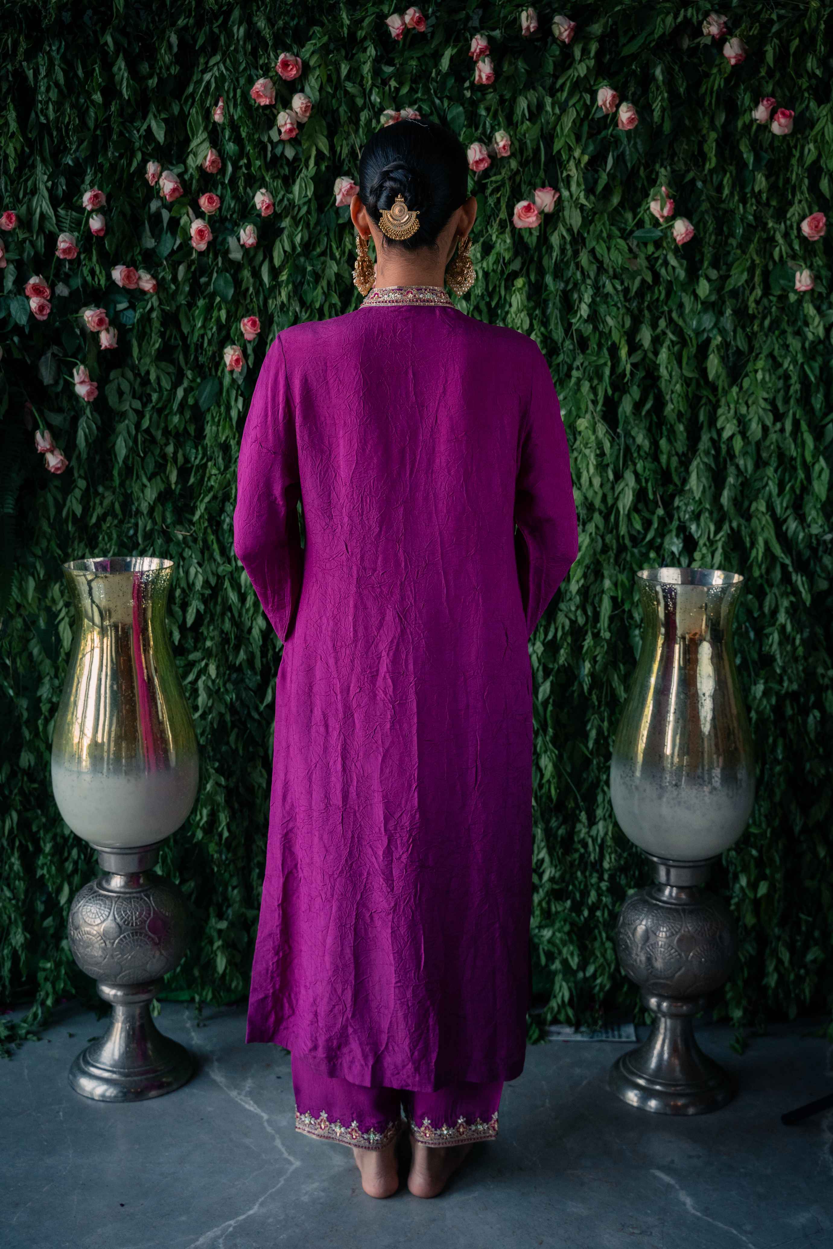 A model showcasing Purple Leheriya Kurta Set by Pooja Singhal from Pooja Singhal's collection