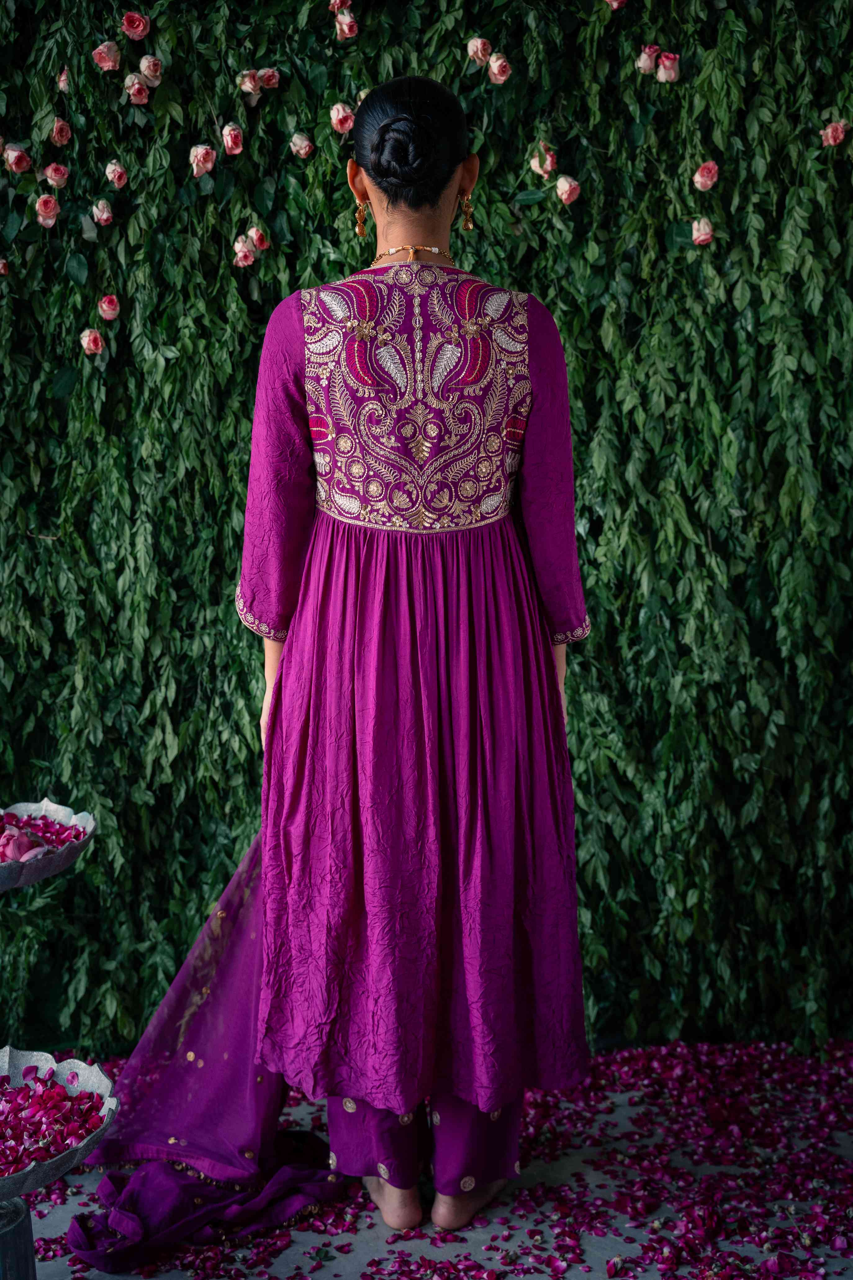 A model showcasing Mauve Kamal Crushed Silk Kurta Set by Pooja Singhal from Pooja Singhal's collection