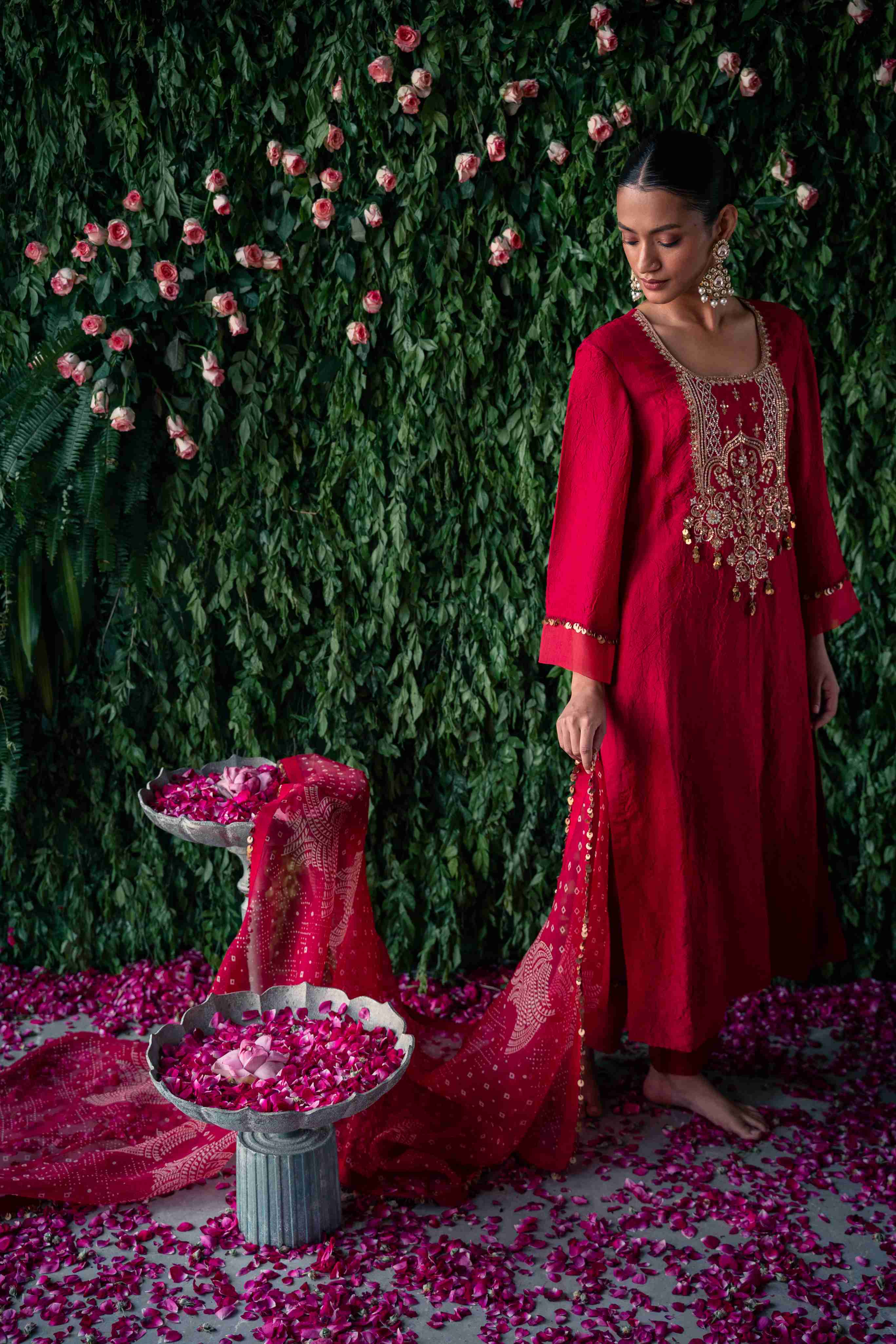 A model showcasing Coral Embroidered Crushed Silk Kurta Set by Pooja Singhal from Pooja Singhal's collection