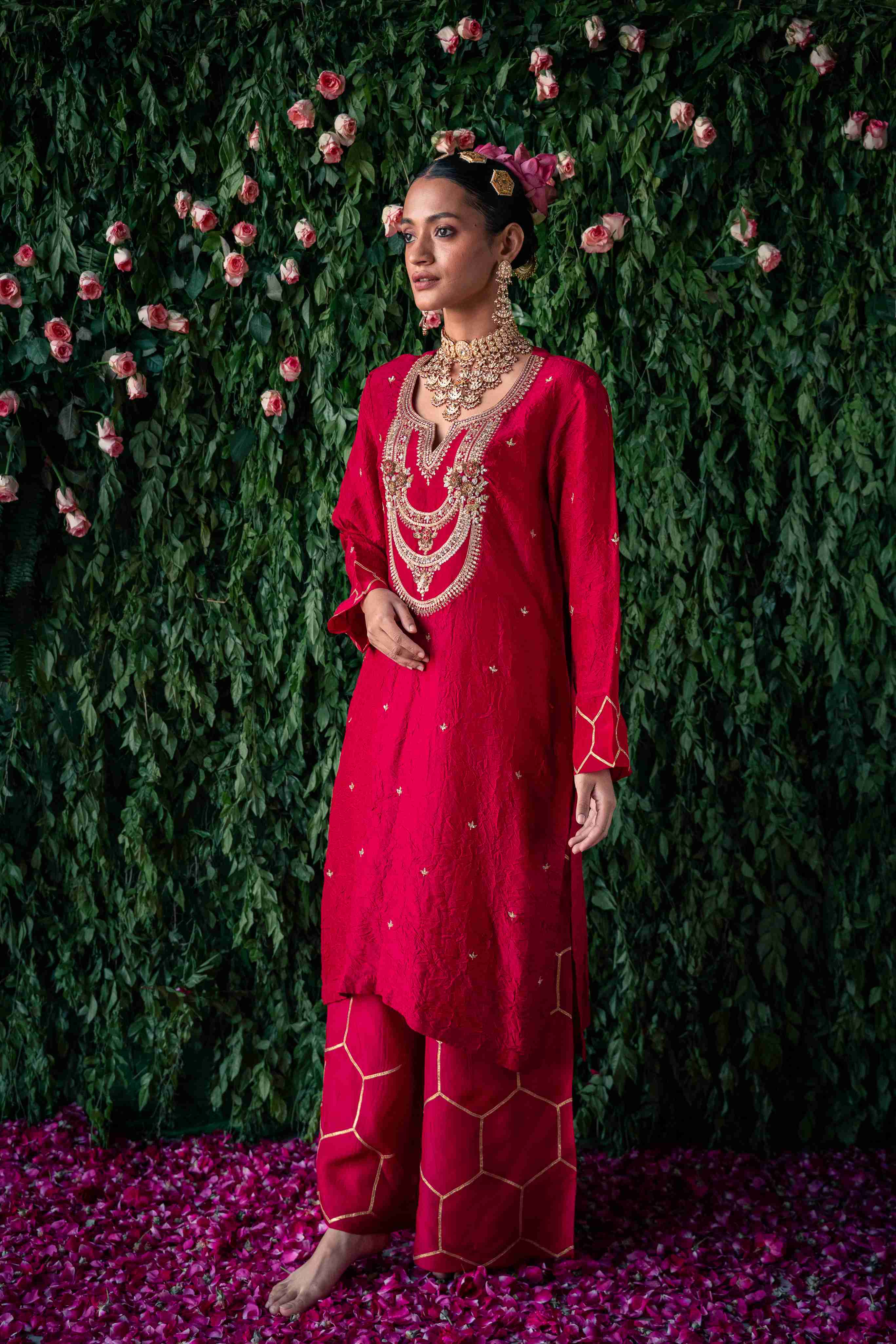 A model showcasing Red Rose Embroidered Kurta Set by Pooja Singhal from Pooja Singhal's collection