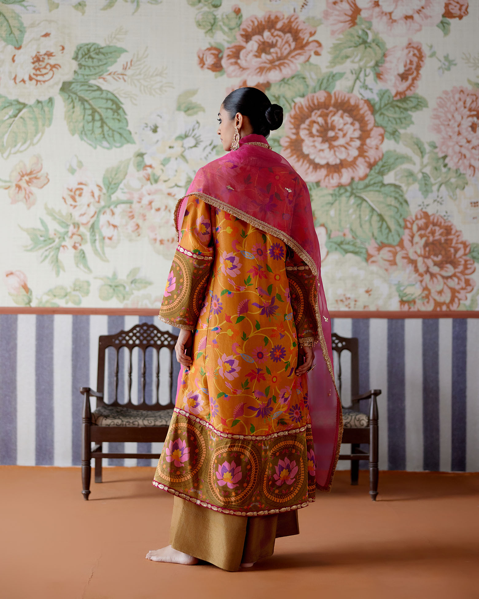 A model showcasing Orange Paithani Print Kurta Set by Pooja Singhal from Pooja Singhal's collection