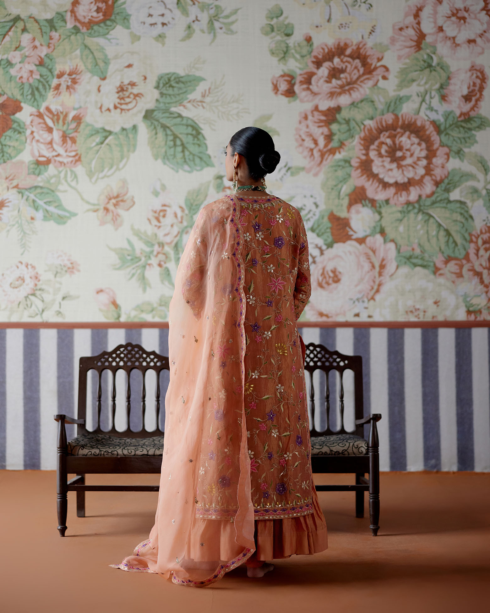 A model showcasing Tissue Kurta With Crushed Inner And Churidaar Pants by Pooja Singhal from Pooja Singhal's collection