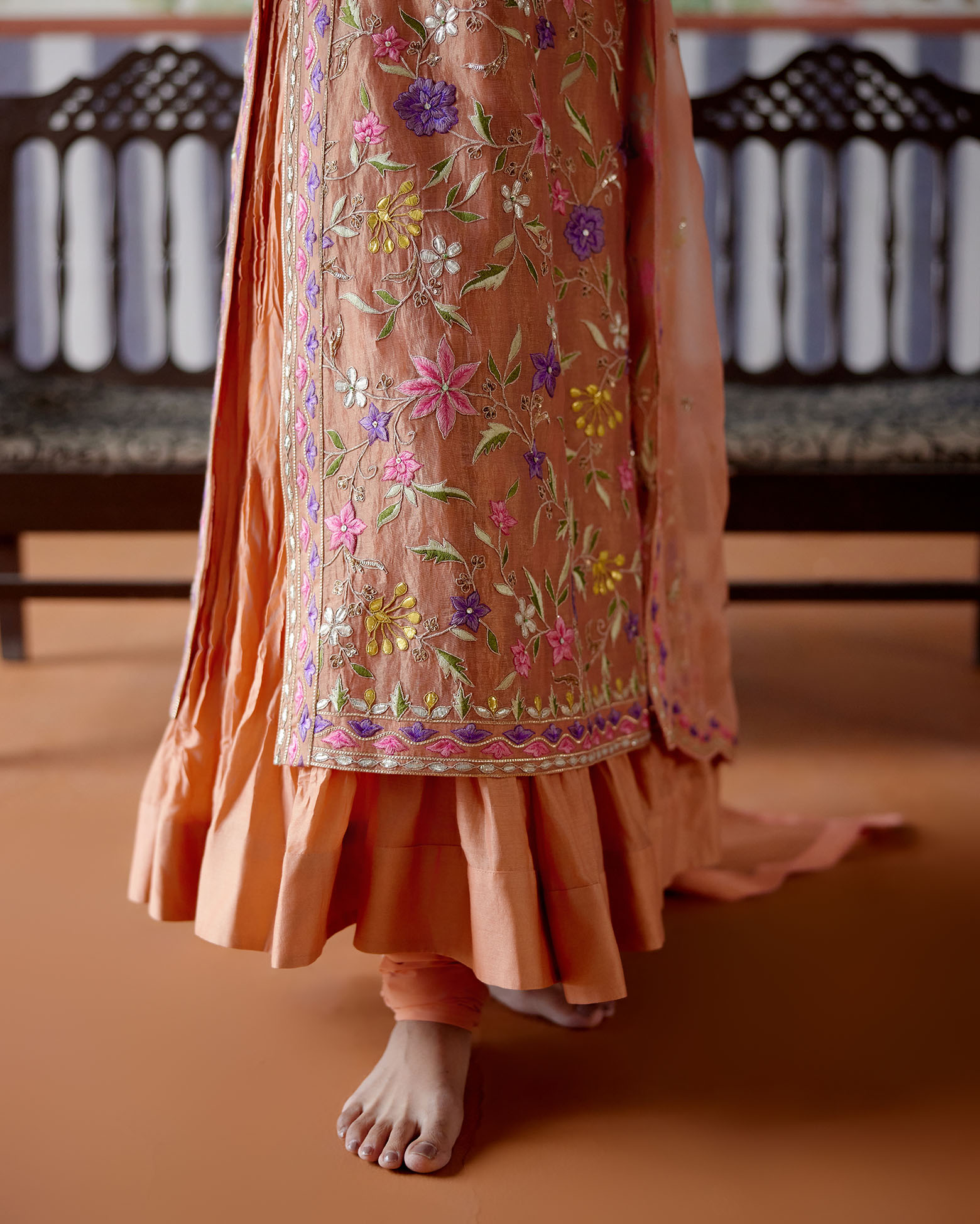 A model showcasing Tissue Kurta With Crushed Inner And Churidaar Pants by Pooja Singhal from Pooja Singhal's collection