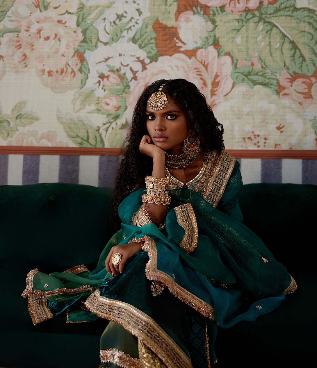 A model showcasing Teal Velvet Kurta Set by Pooja Singhal from Pooja Singhal's collection