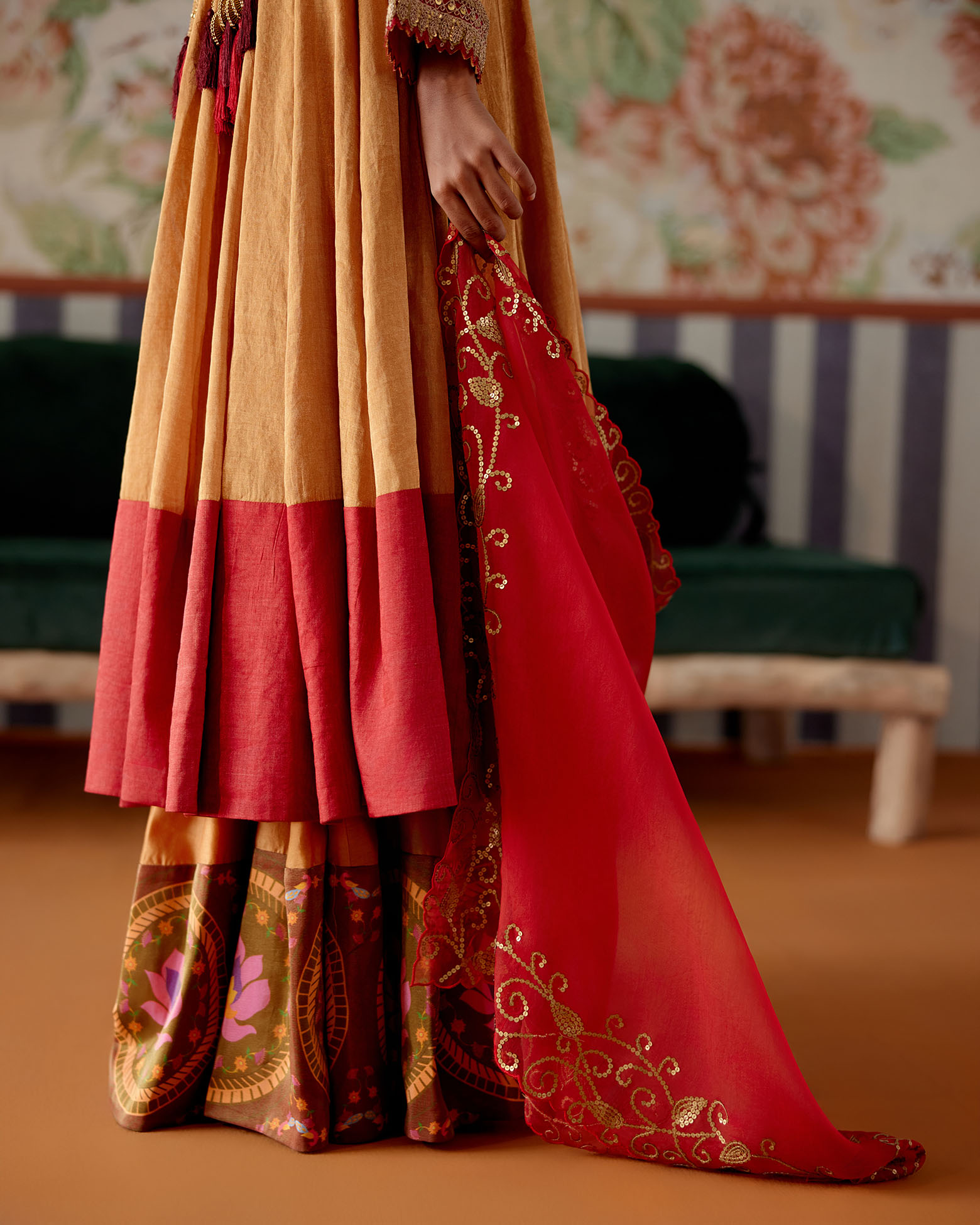 A model showcasing Orange Anarkali And Sharara Set by Pooja Singhal from Pooja Singhal's collection